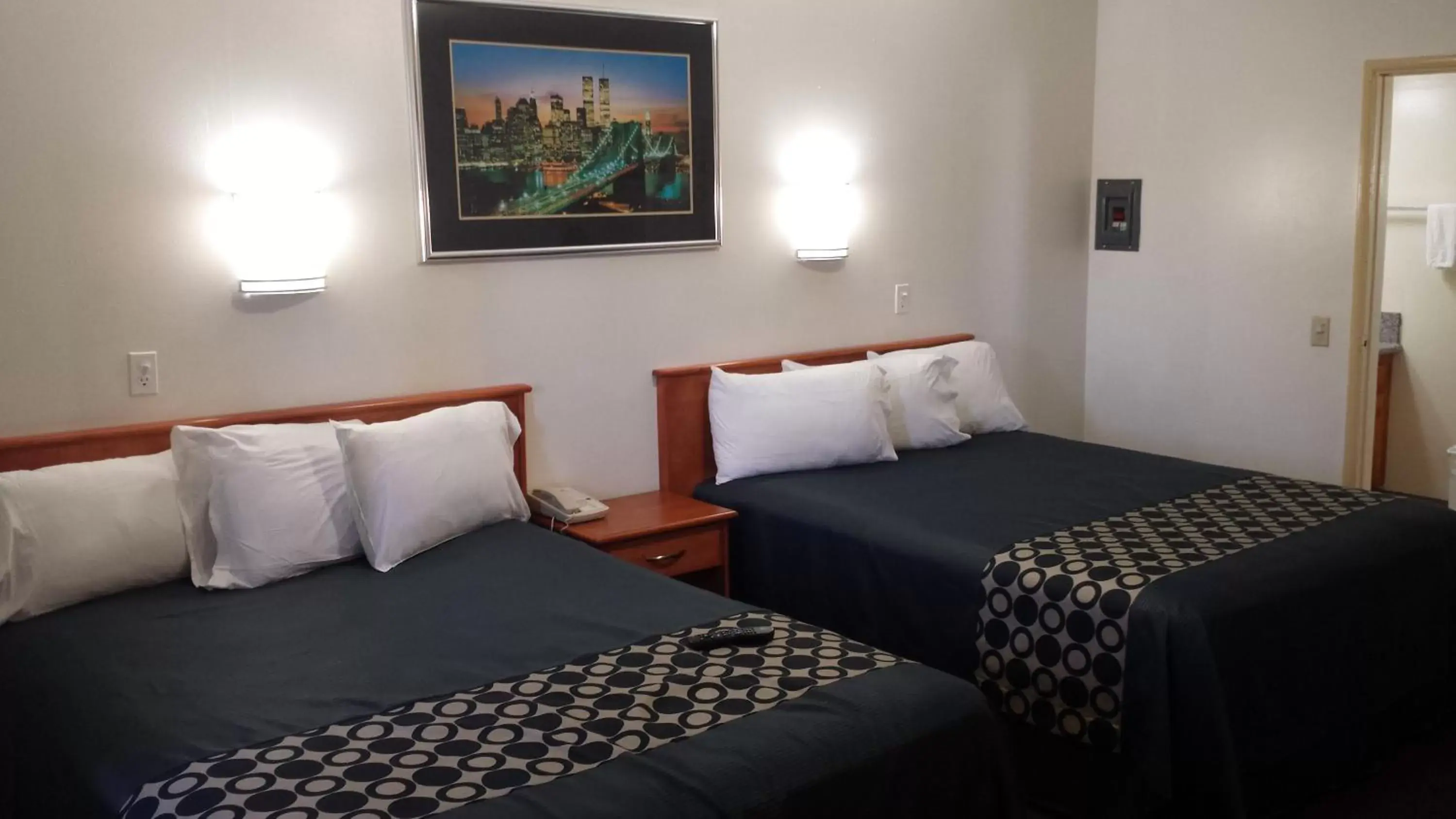 Bed in Americas Best Value Inn Beaumont California