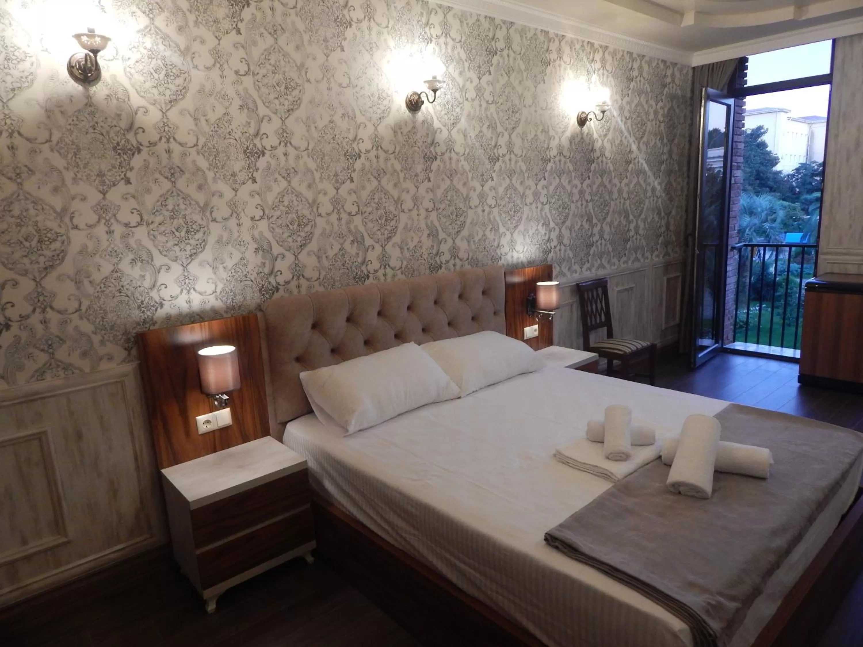 Bed in MELINI Boutique Hotel