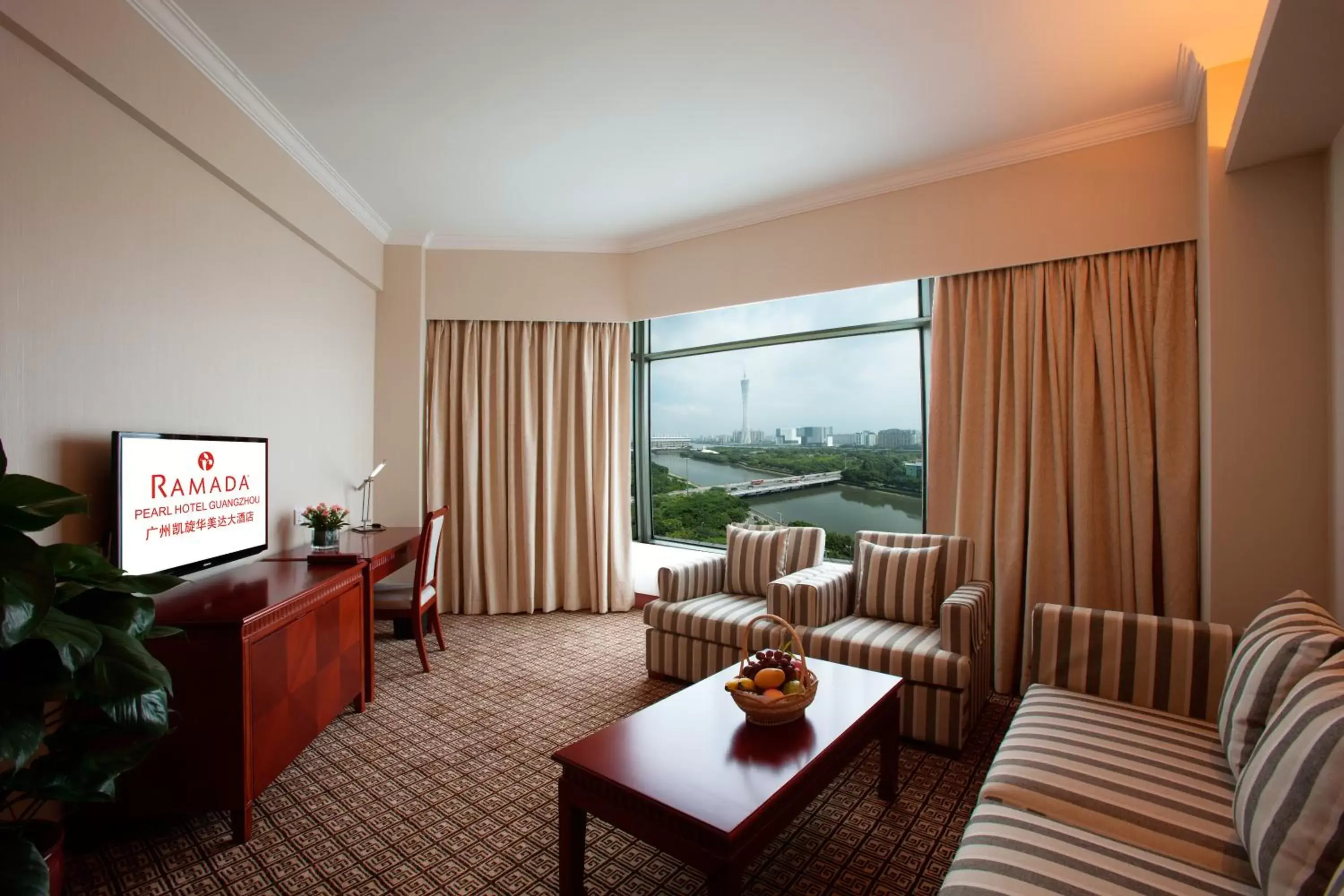 Living room in Ramada by Wyndham Pearl Guangzhou-Canton Fair Free Shuttle Bus