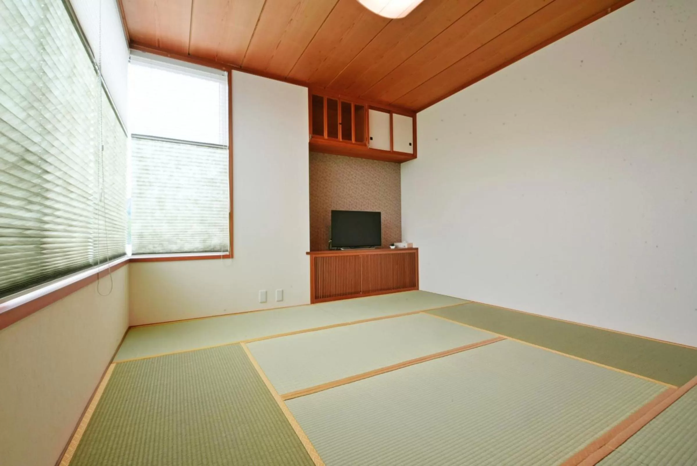 Bedroom in Hostel PLEASURE MARUYAMA