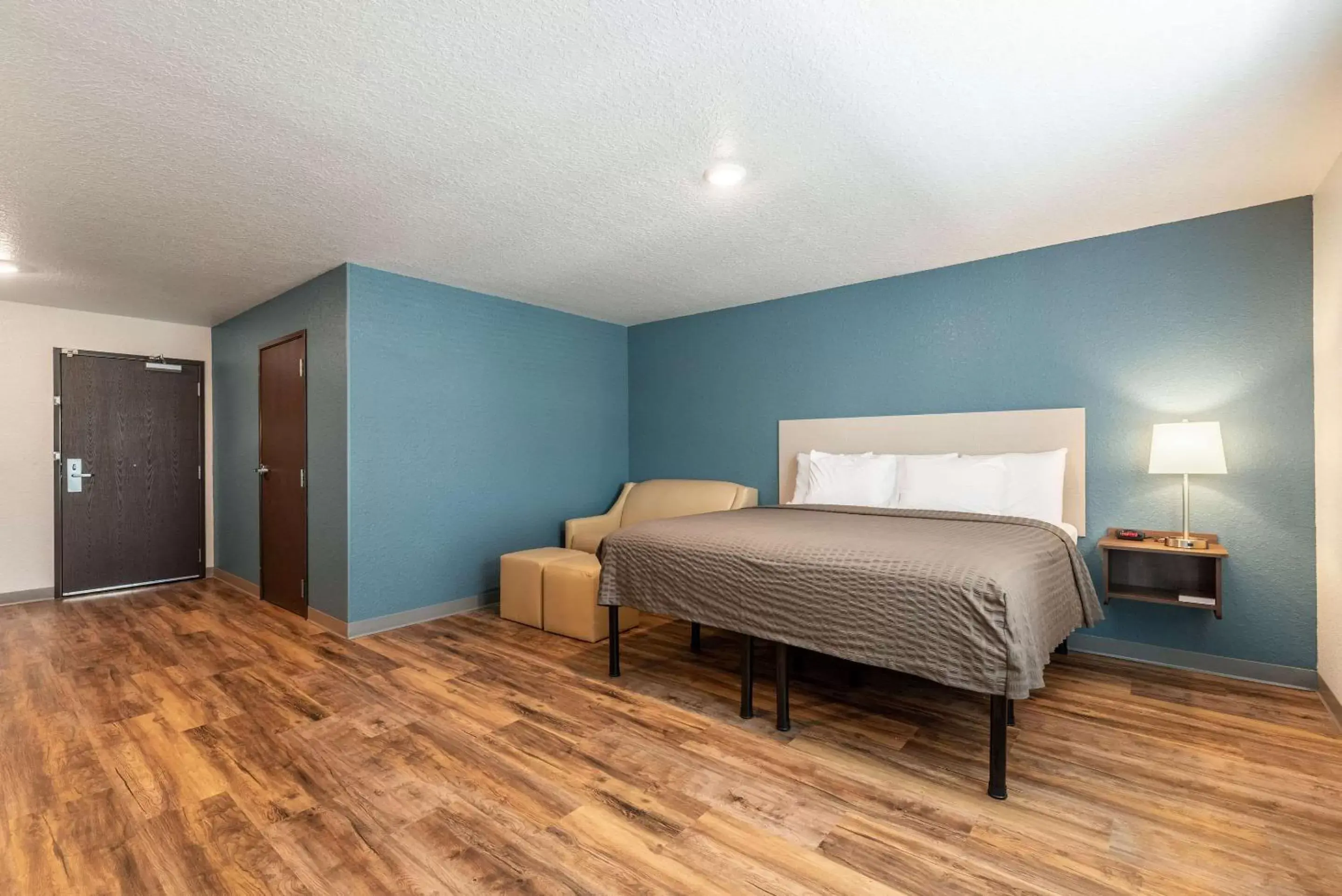 Photo of the whole room, Bed in WoodSpring Suites Sanford North I-4 Orlando Area