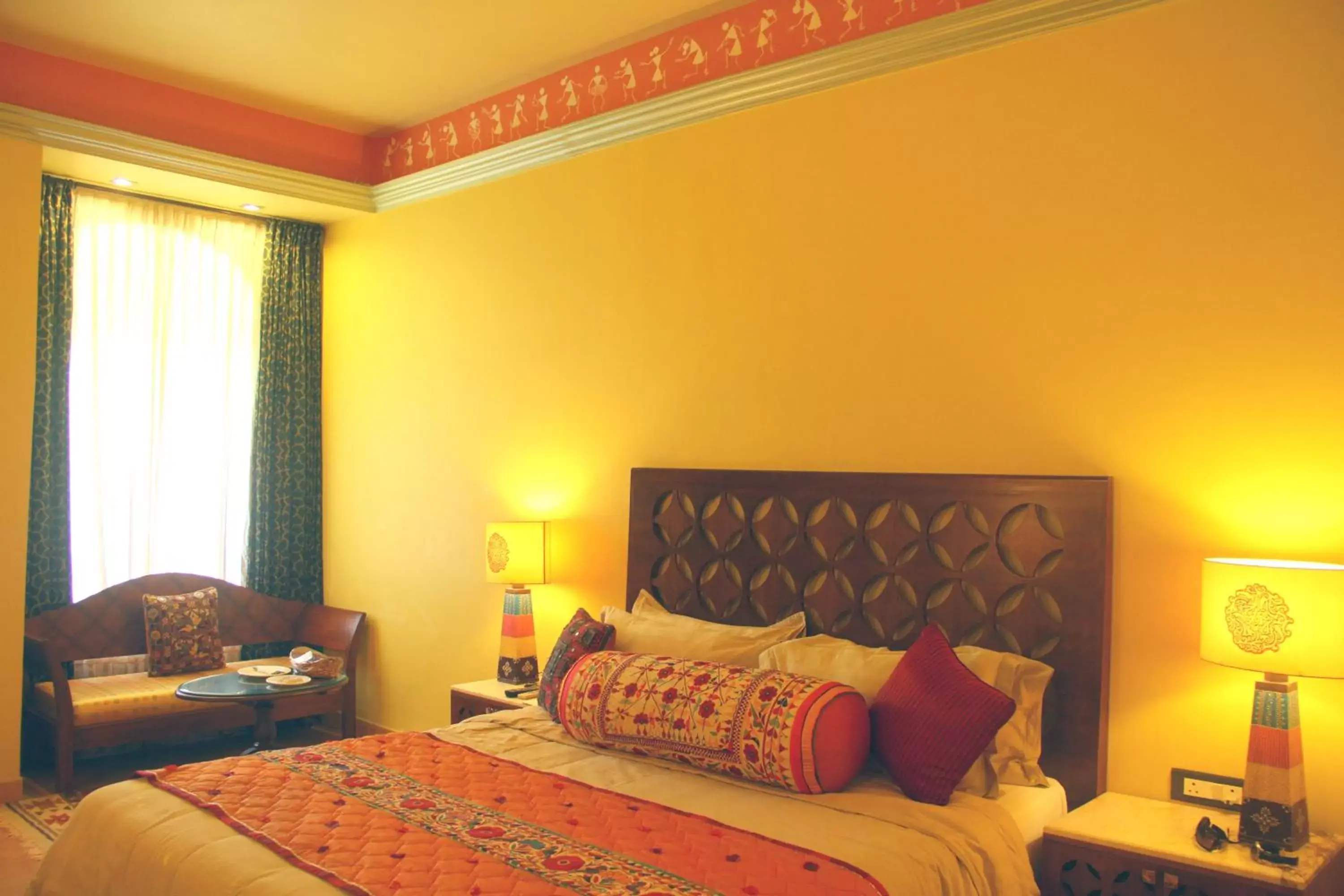 Bed in juSTa Rajputana Resort & Spa