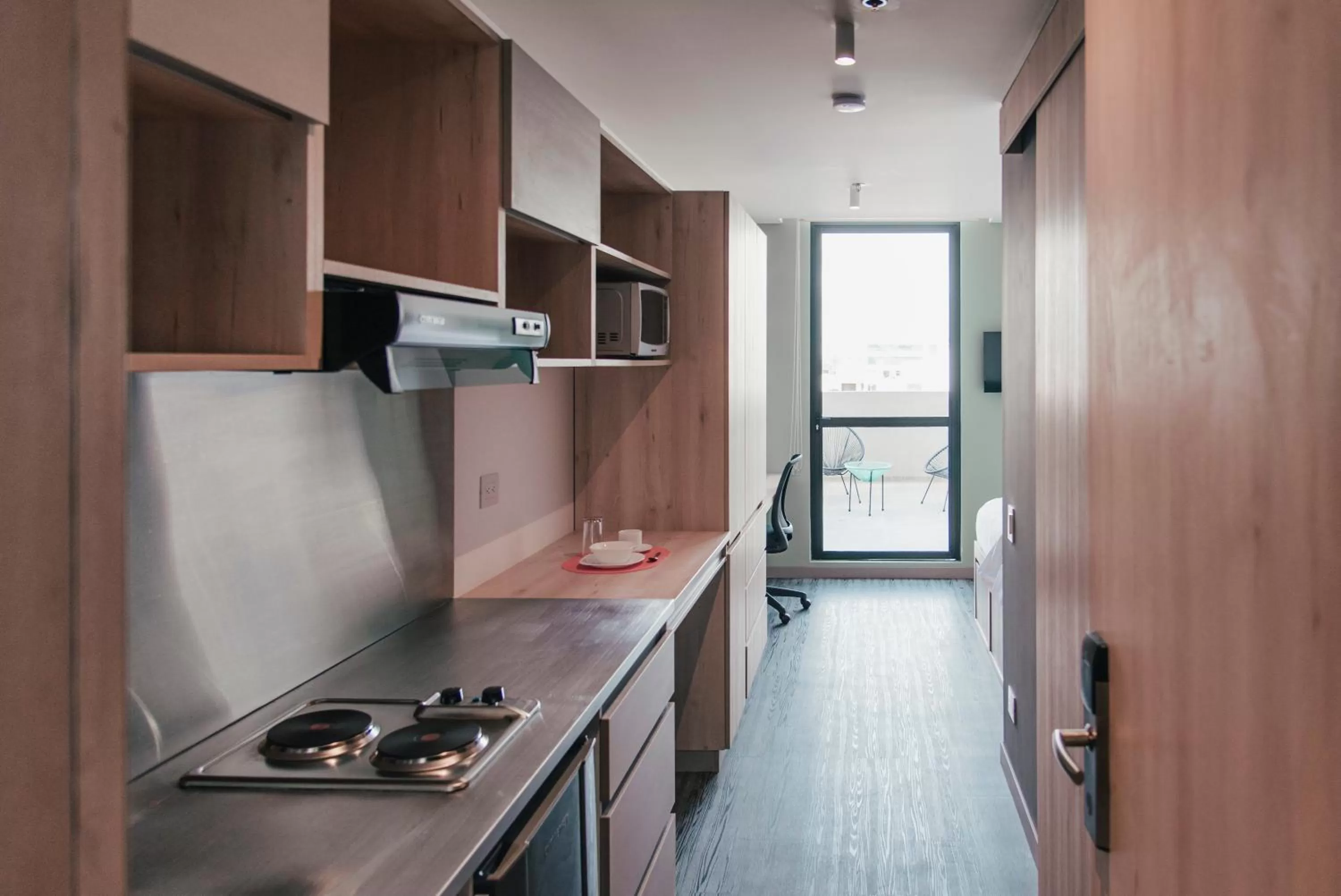 Kitchen or kitchenette in UMA Suites Chia