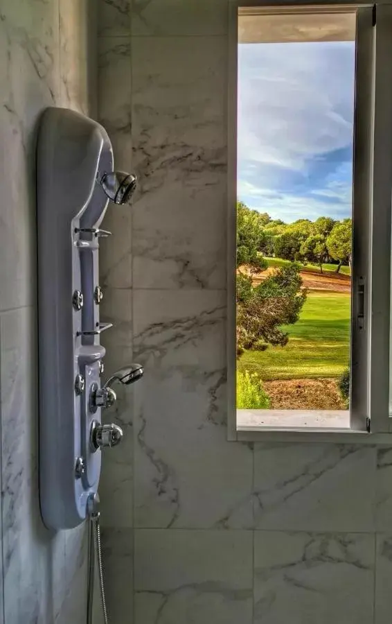 Bathroom in Villamartin Hotel GHB