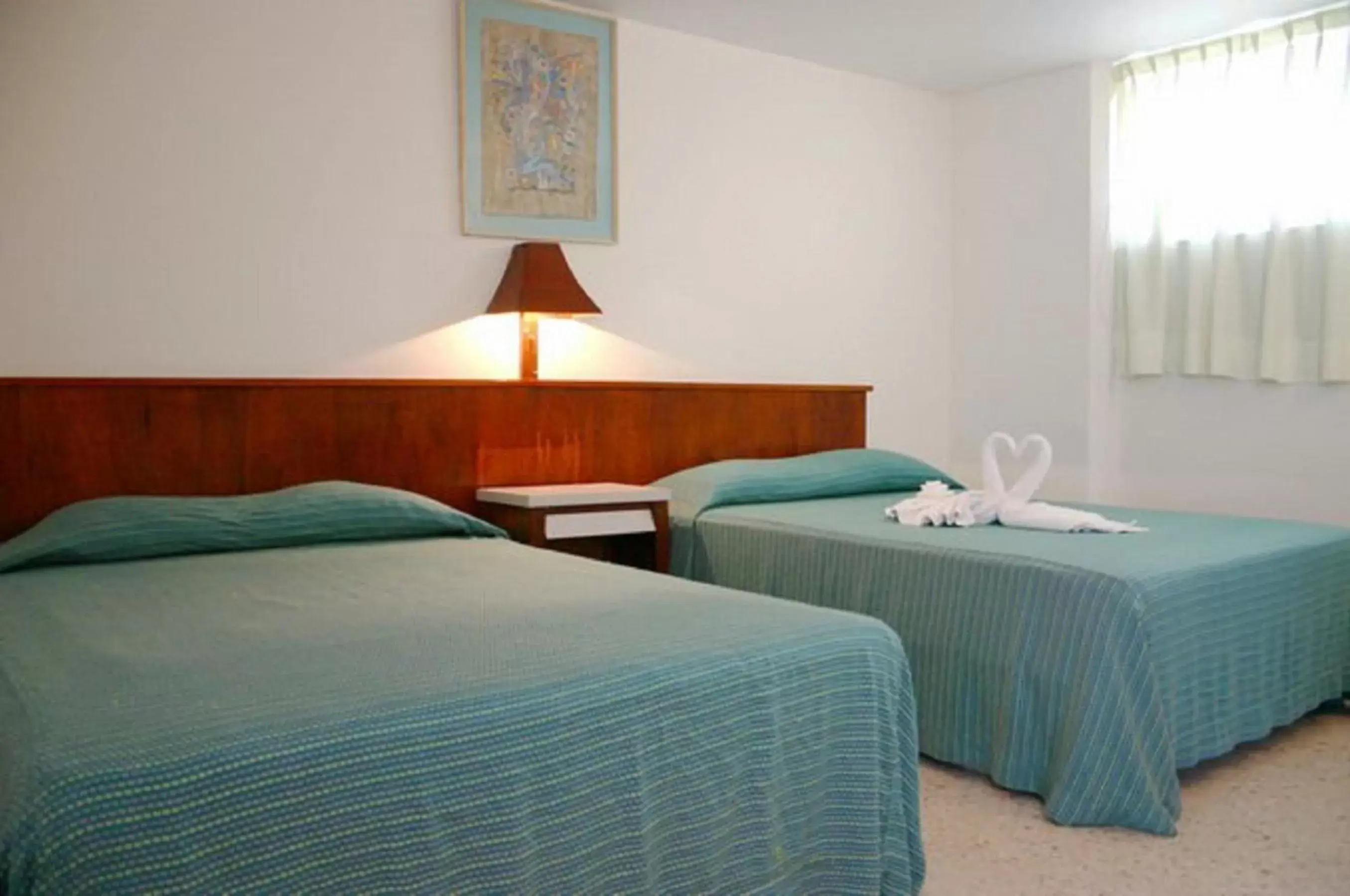 Bedroom, Bed in Alba Suites Acapulco