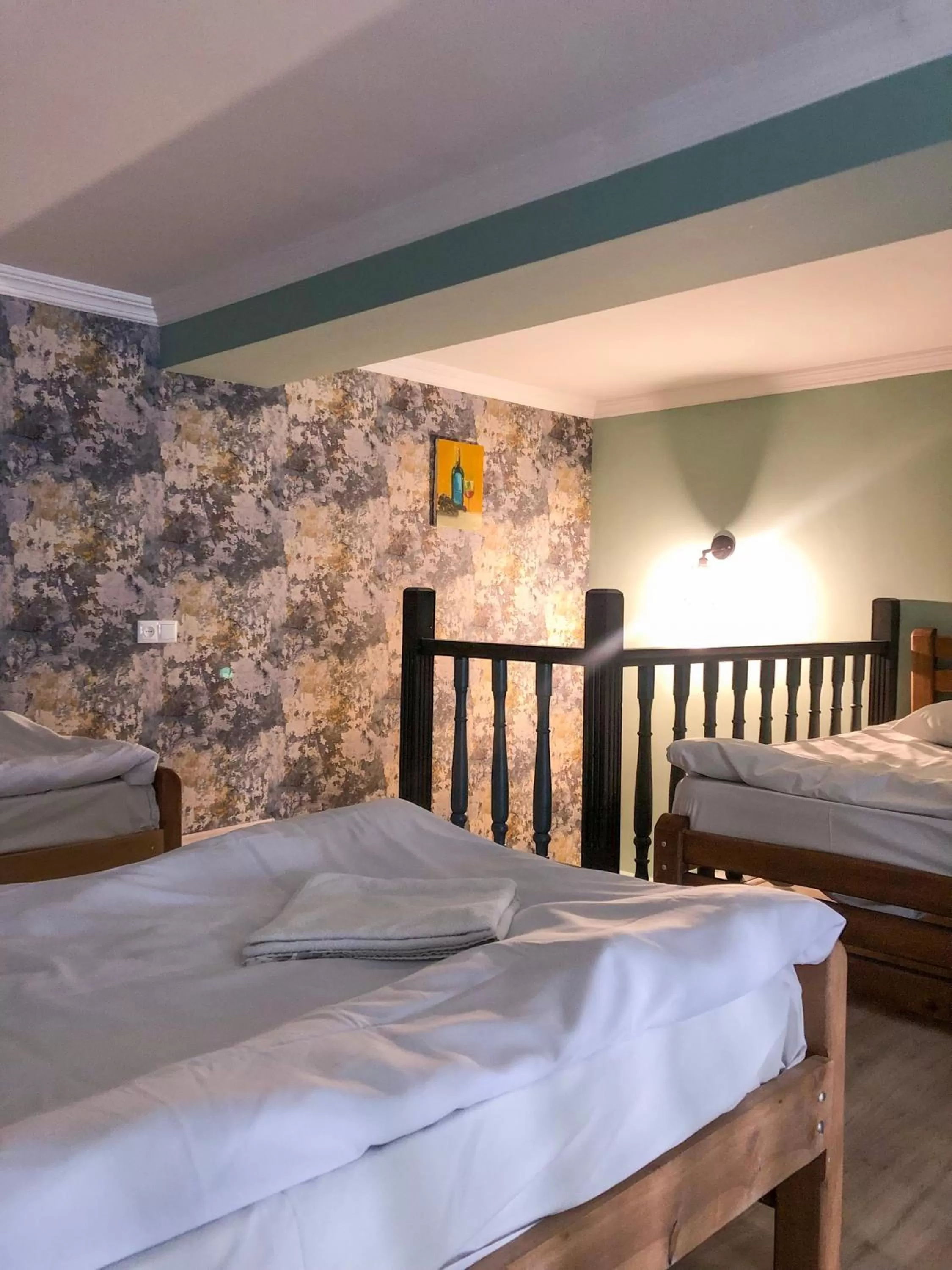 Bed in Check Point Hotel