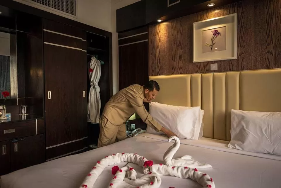 Staff, Bed in Kuwait Continental Hotel