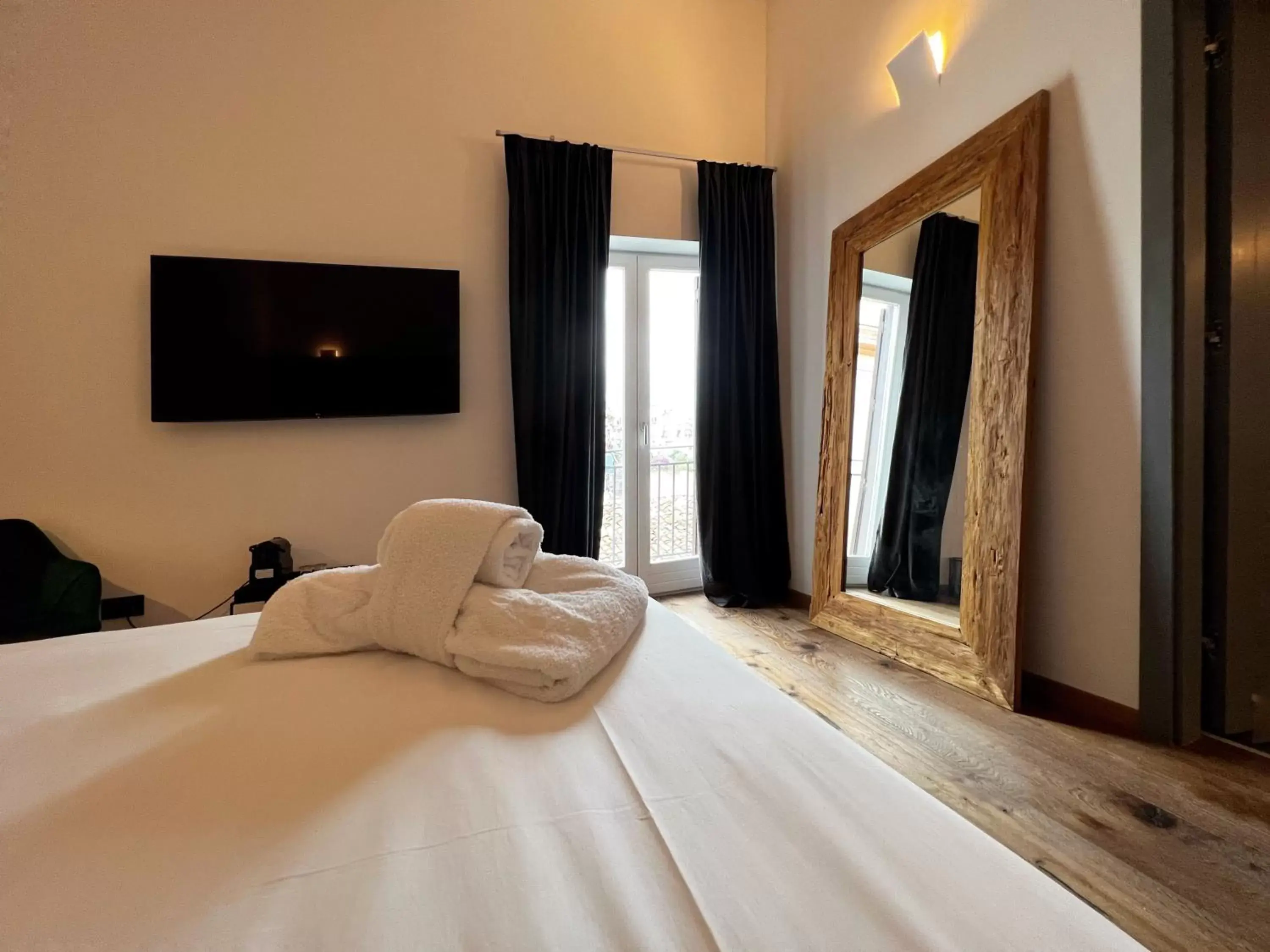 Bed in Gioiamia - Luxury Rooms in Cattedrale