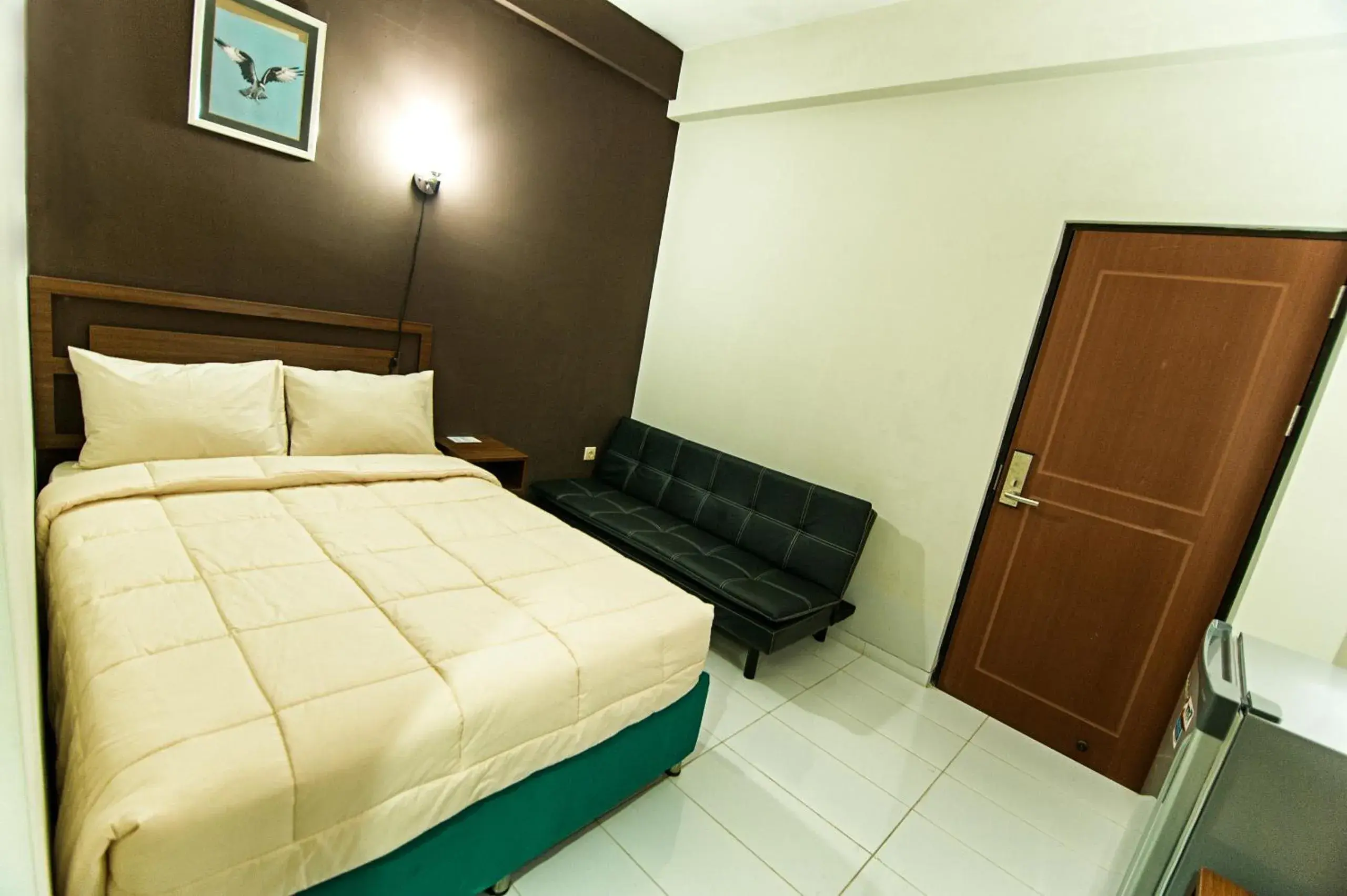 Photo of the whole room, Bed in Grace Setia Hotel