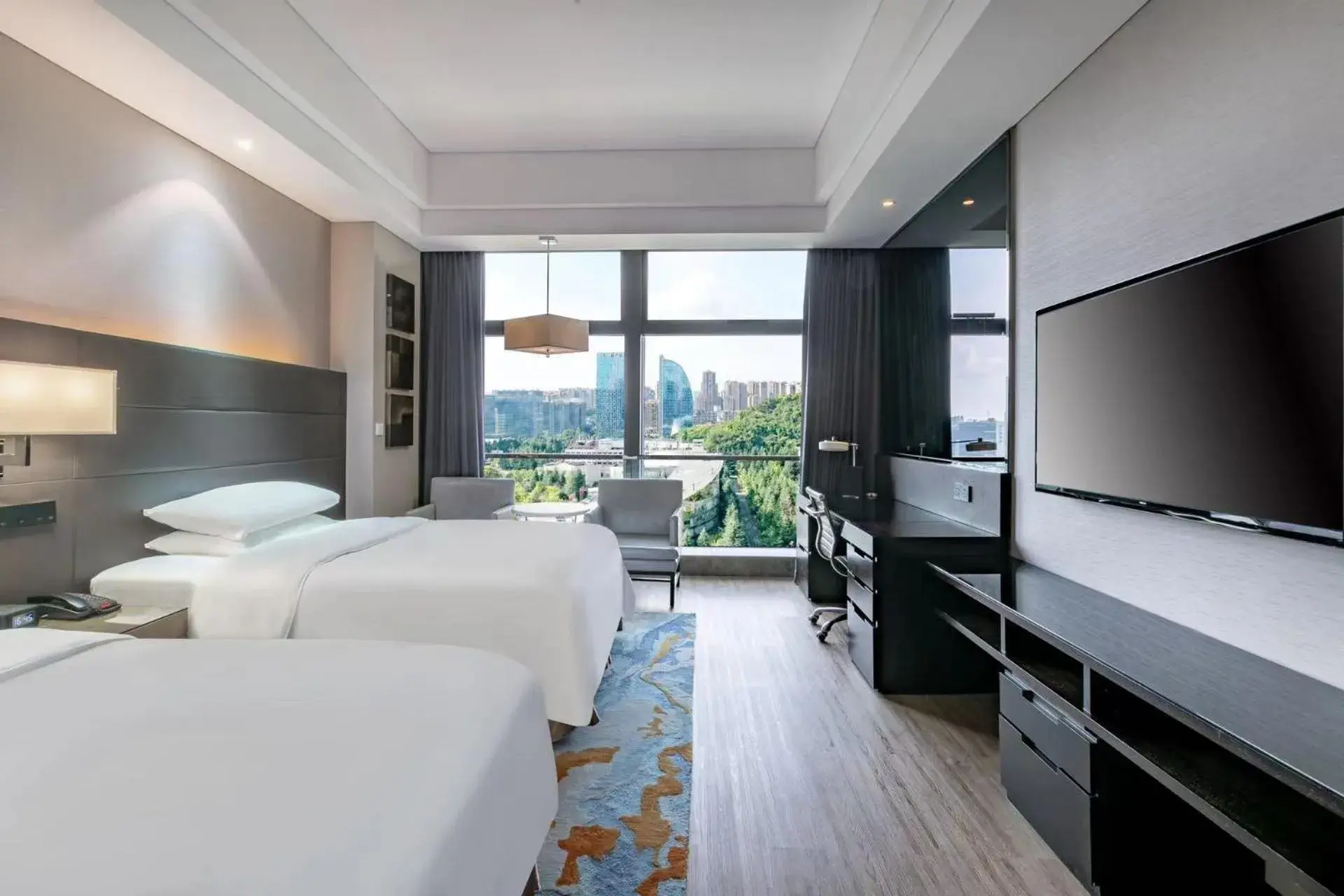 Bed in Renaissance Guiyang Hotel