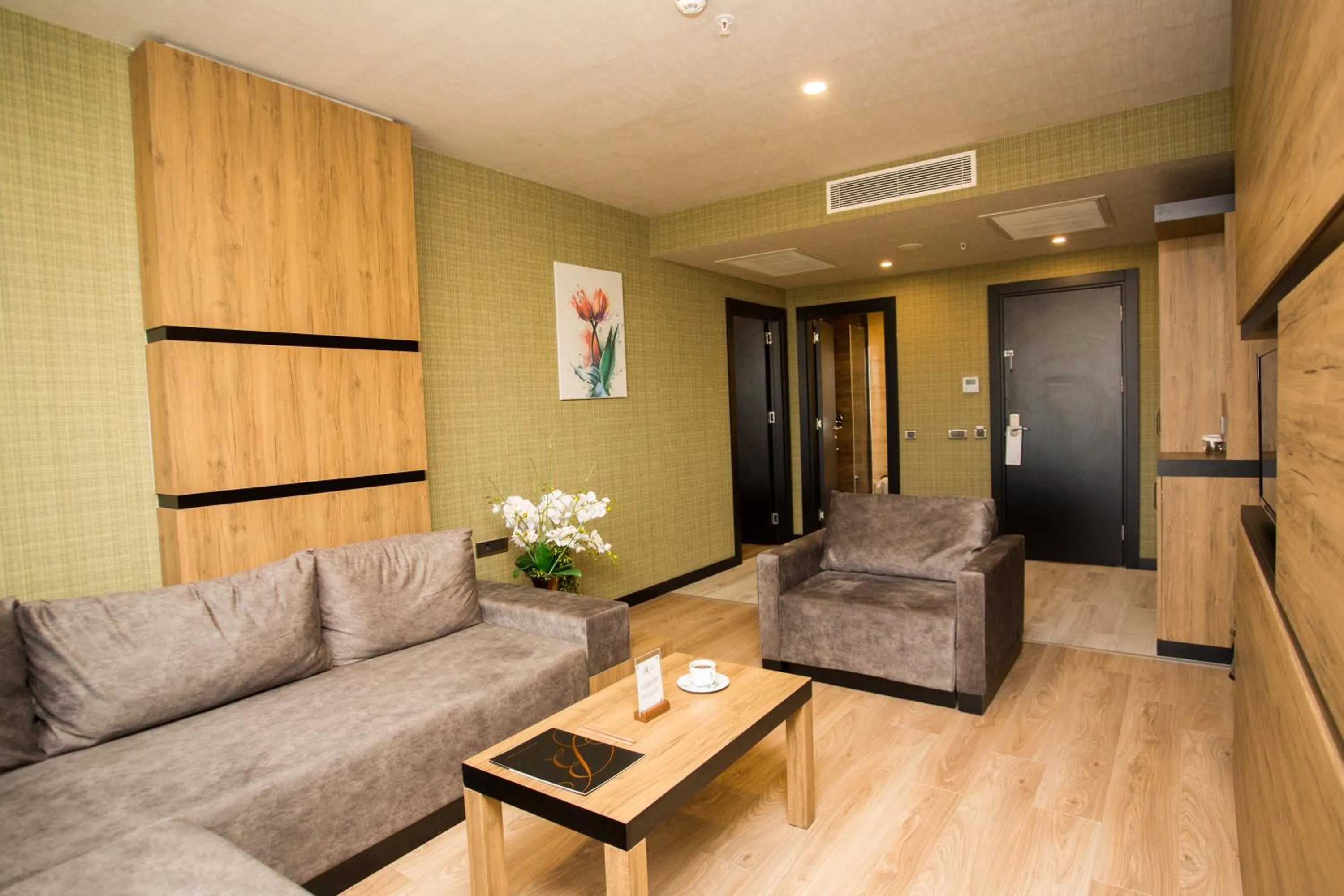 Living room in SKY Business Hotel