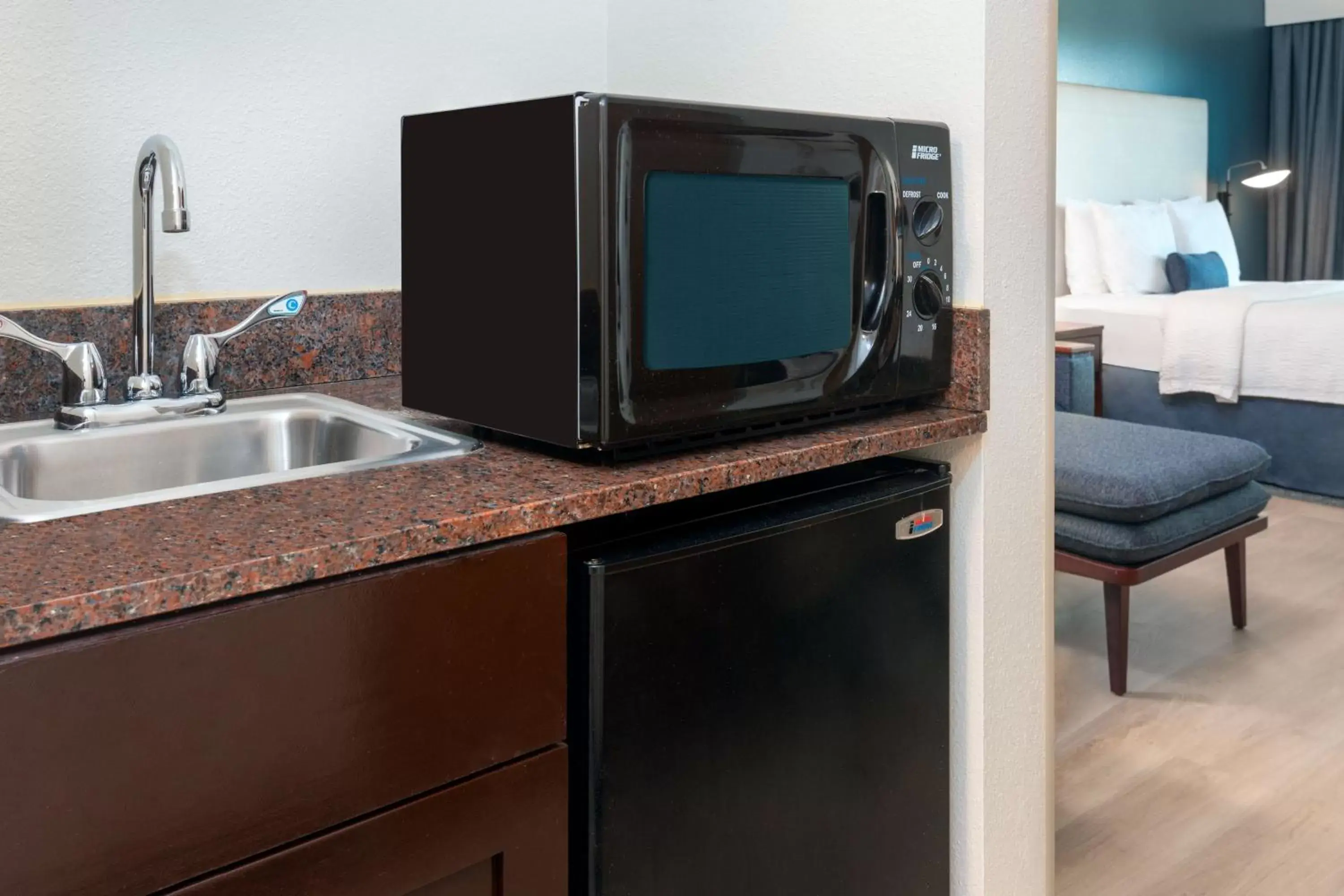 Photo of the whole room, TV/Entertainment Center in Courtyard by Marriott Sarasota at University Town Center