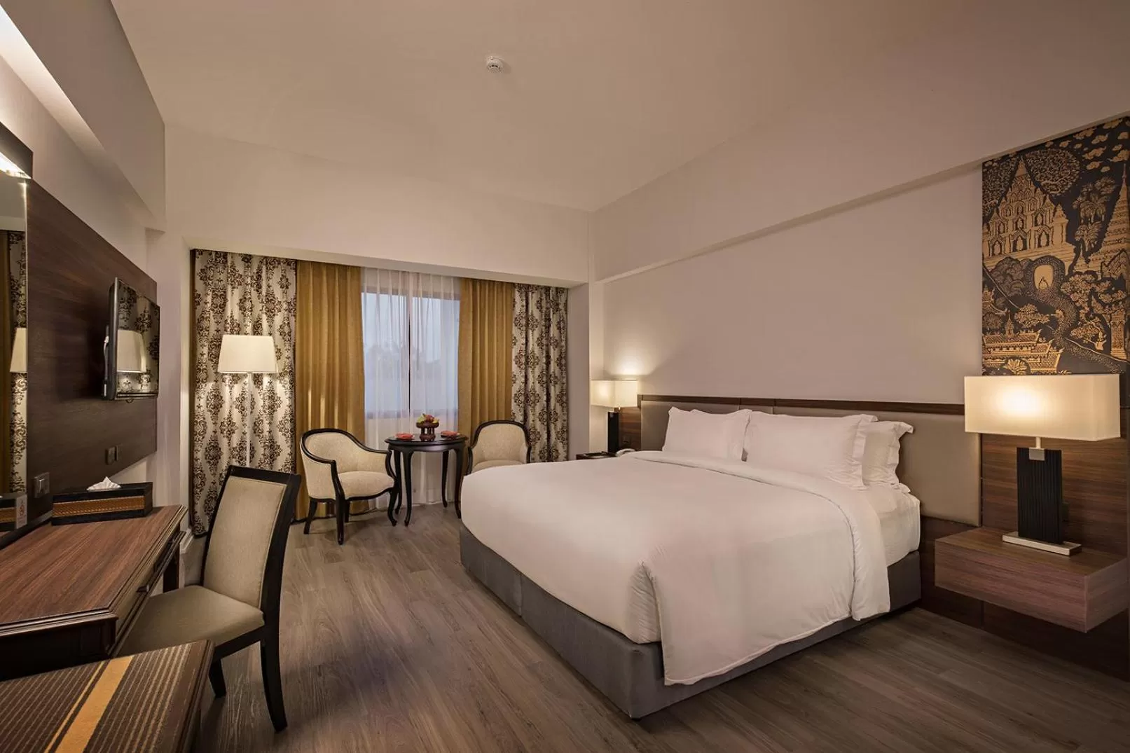 Bed in The Heritage Chiang Rai Hotel and Convention