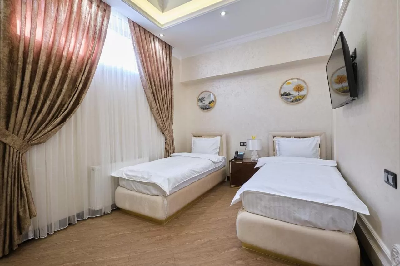 Bed in East Star Hotel