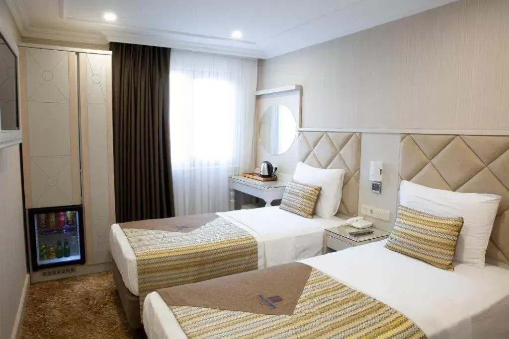 Bed in Alpinn Hotel DUE