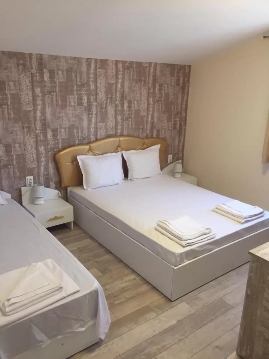 Bed in Family Hotel Malibu