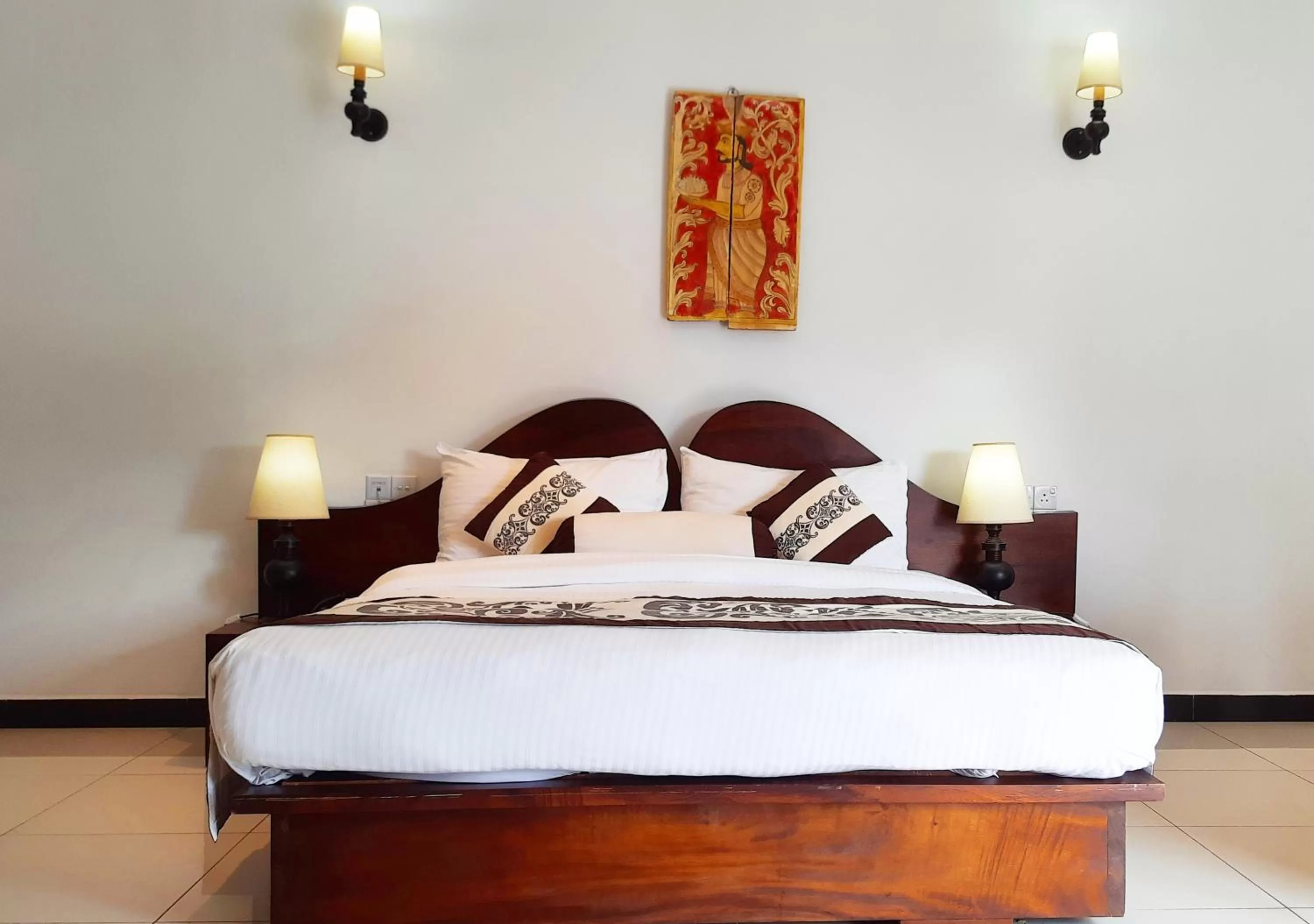 Bed in Royal Kandyan Hotel