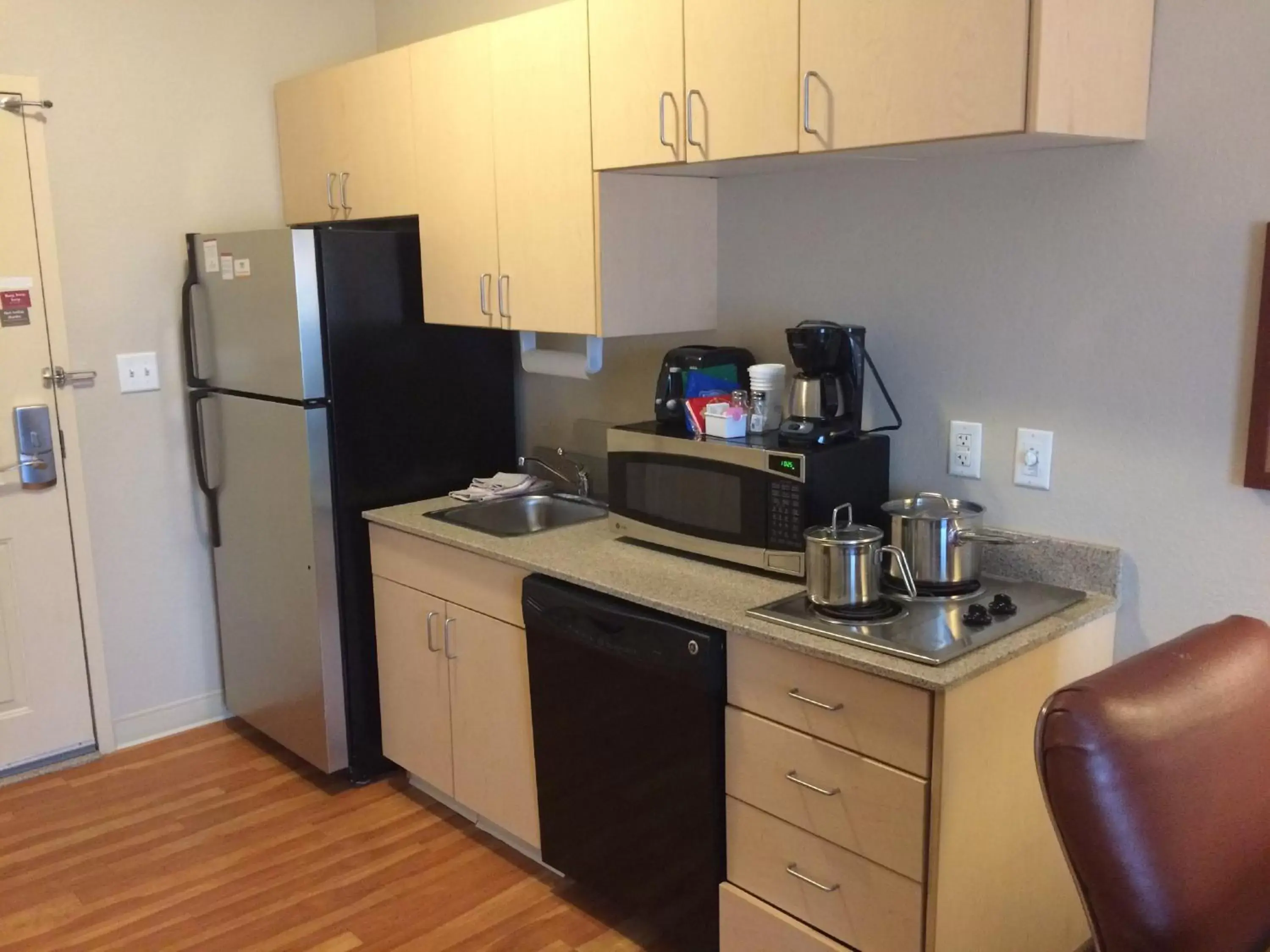 Photo of the whole room, Kitchen/Kitchenette in Candlewood Suites Watertown Fort Drum, an IHG Hotel