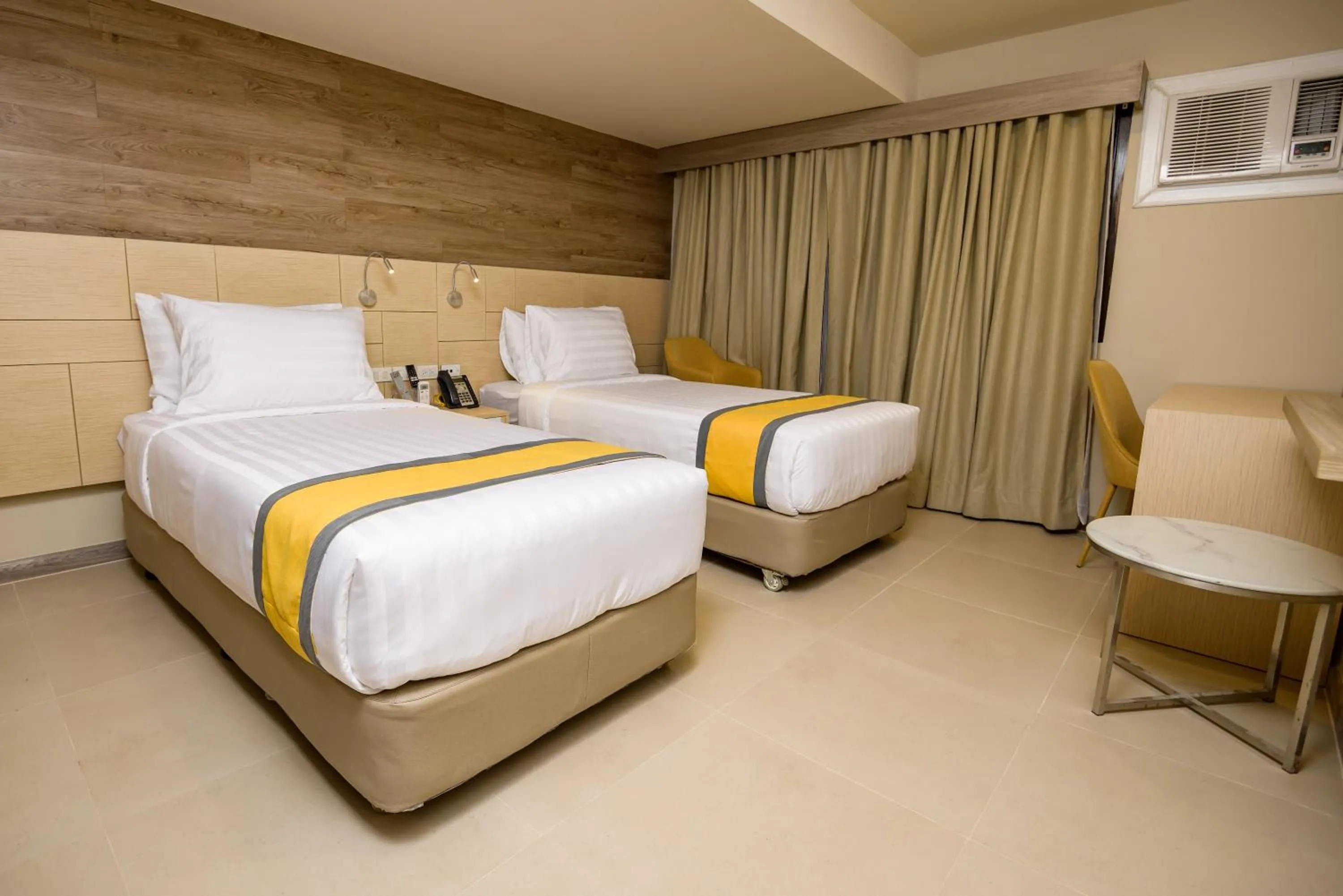 Bed in SureStay Plus by Best Western Cebu City