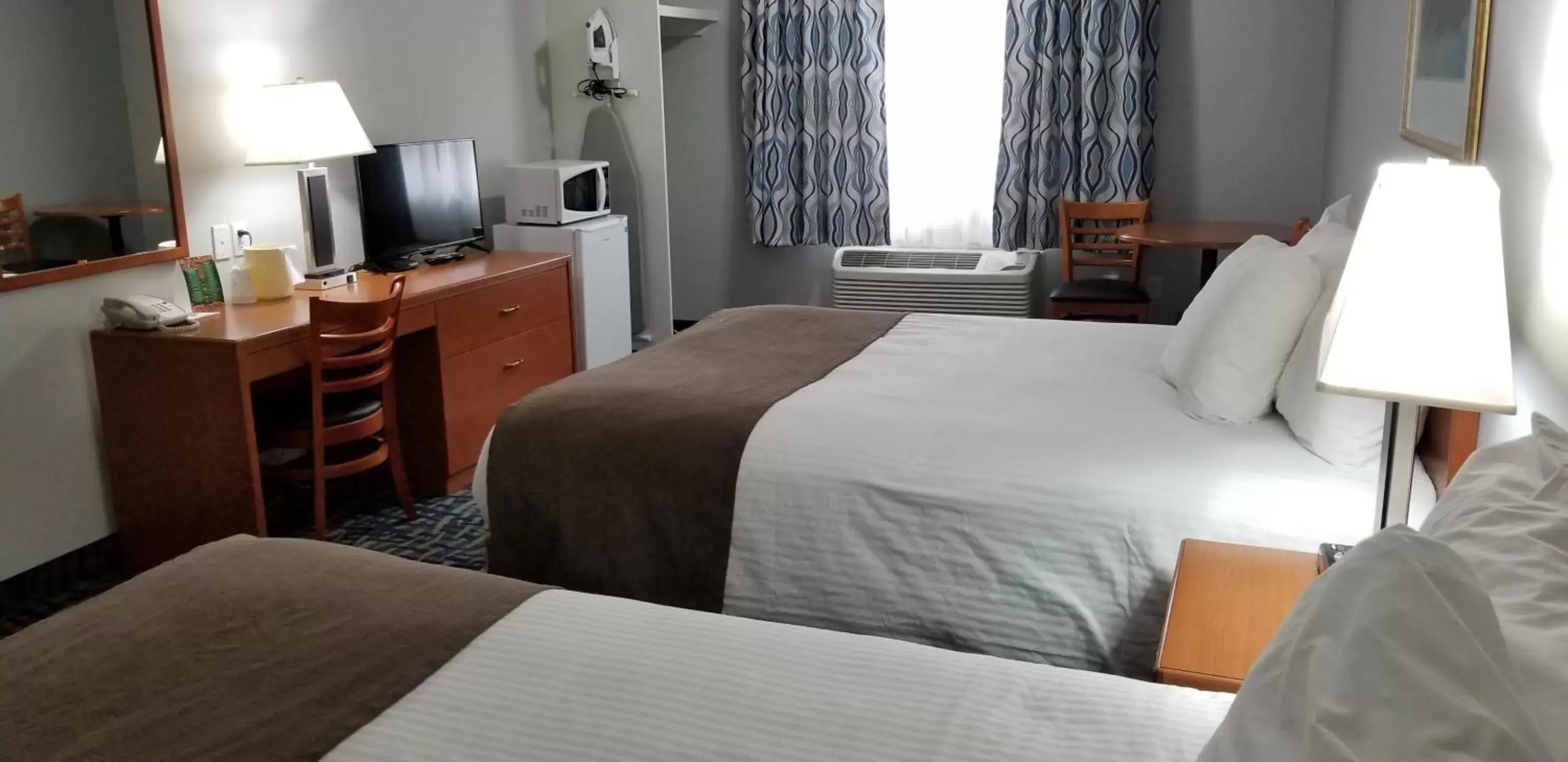 Photo of the whole room, Bed in SureStay Plus Hotel by Best Western Lethbridge