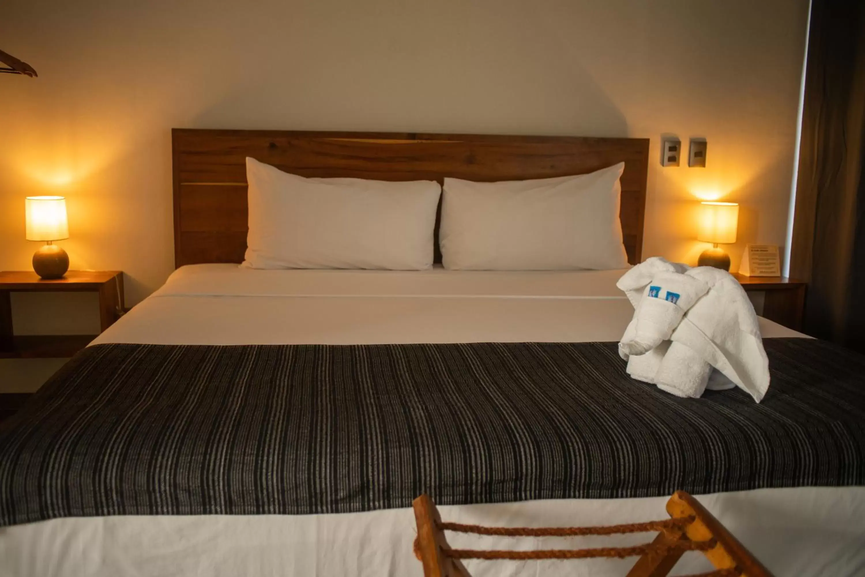 Bed in Hotel Muyu Tulum