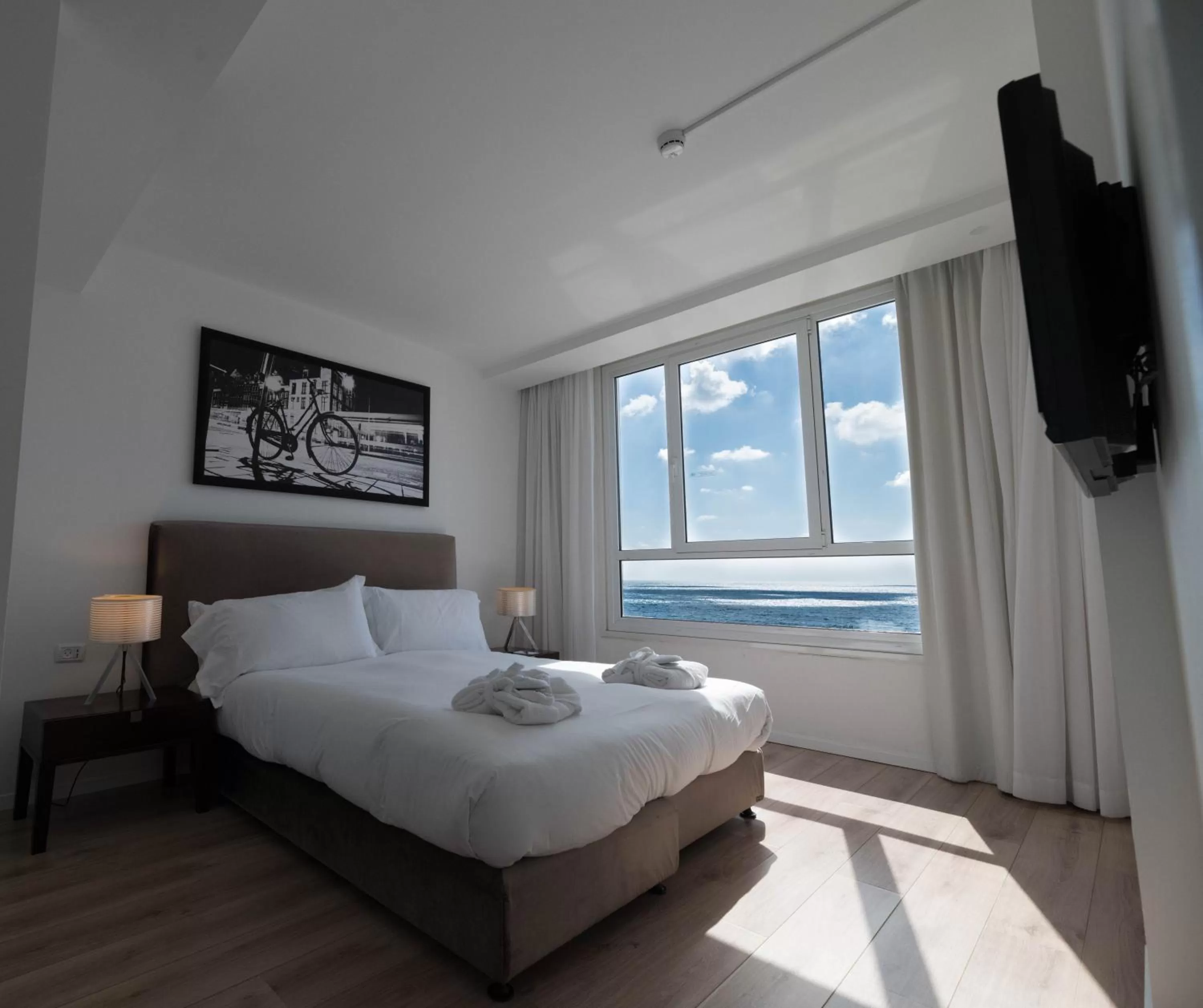 Bed in Sea view apartment suite