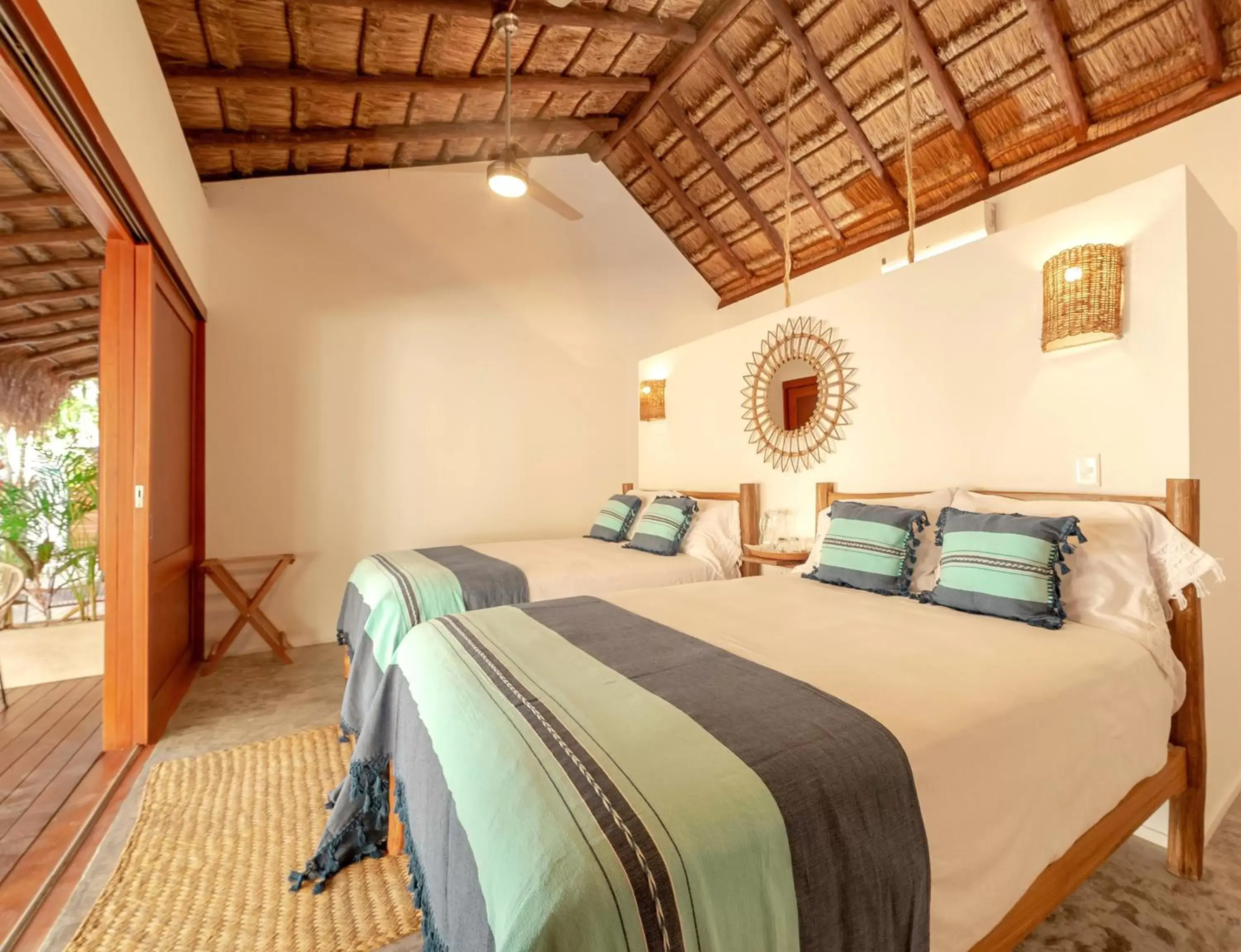 Photo of the whole room, Bed in Mimosa Tulum