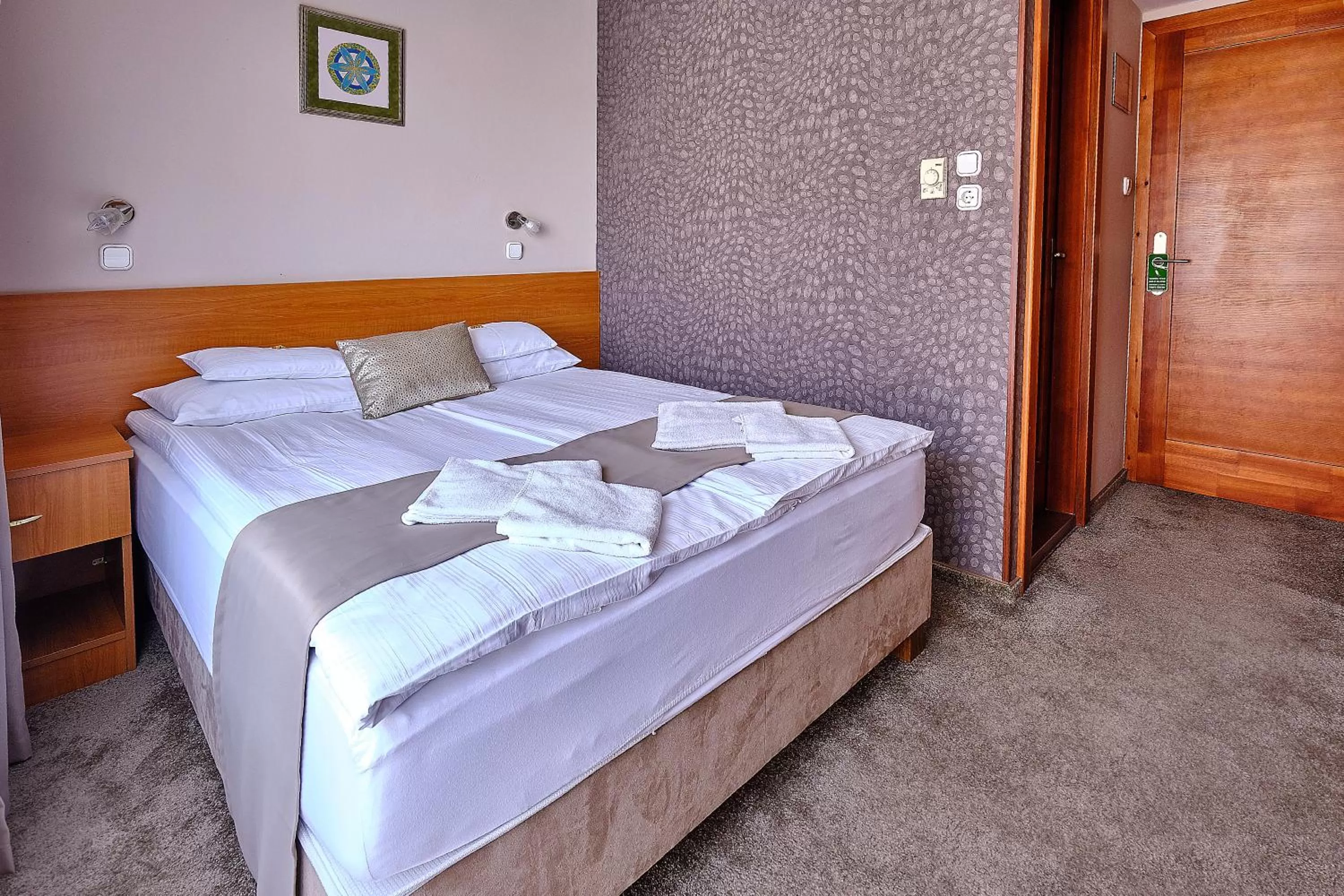 Bed in Lugas Hotel