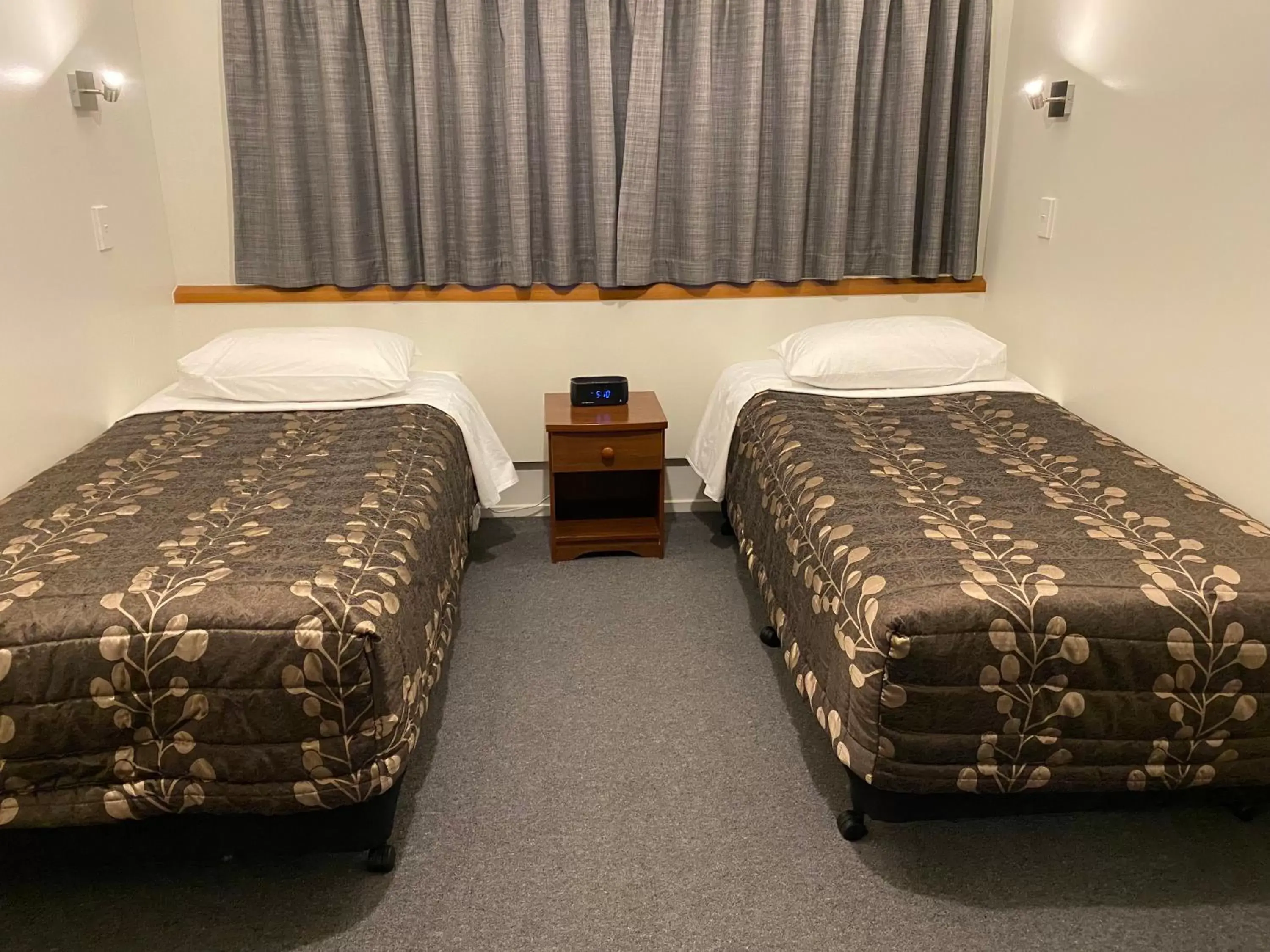 Bed in ASURE Townsman Motor Lodge