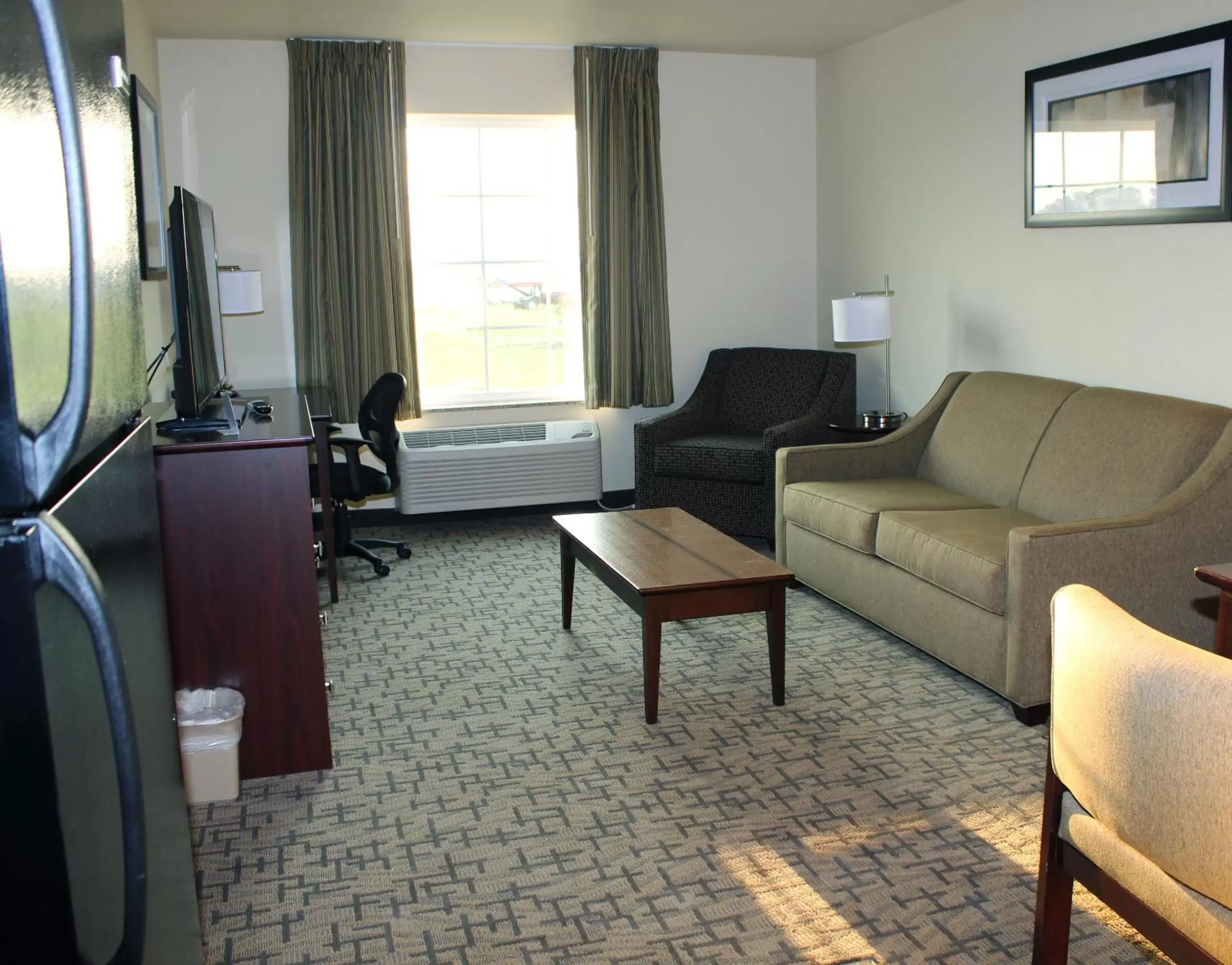 Living room, Seating Area in Cobblestone Inn & Suites - Lamoni