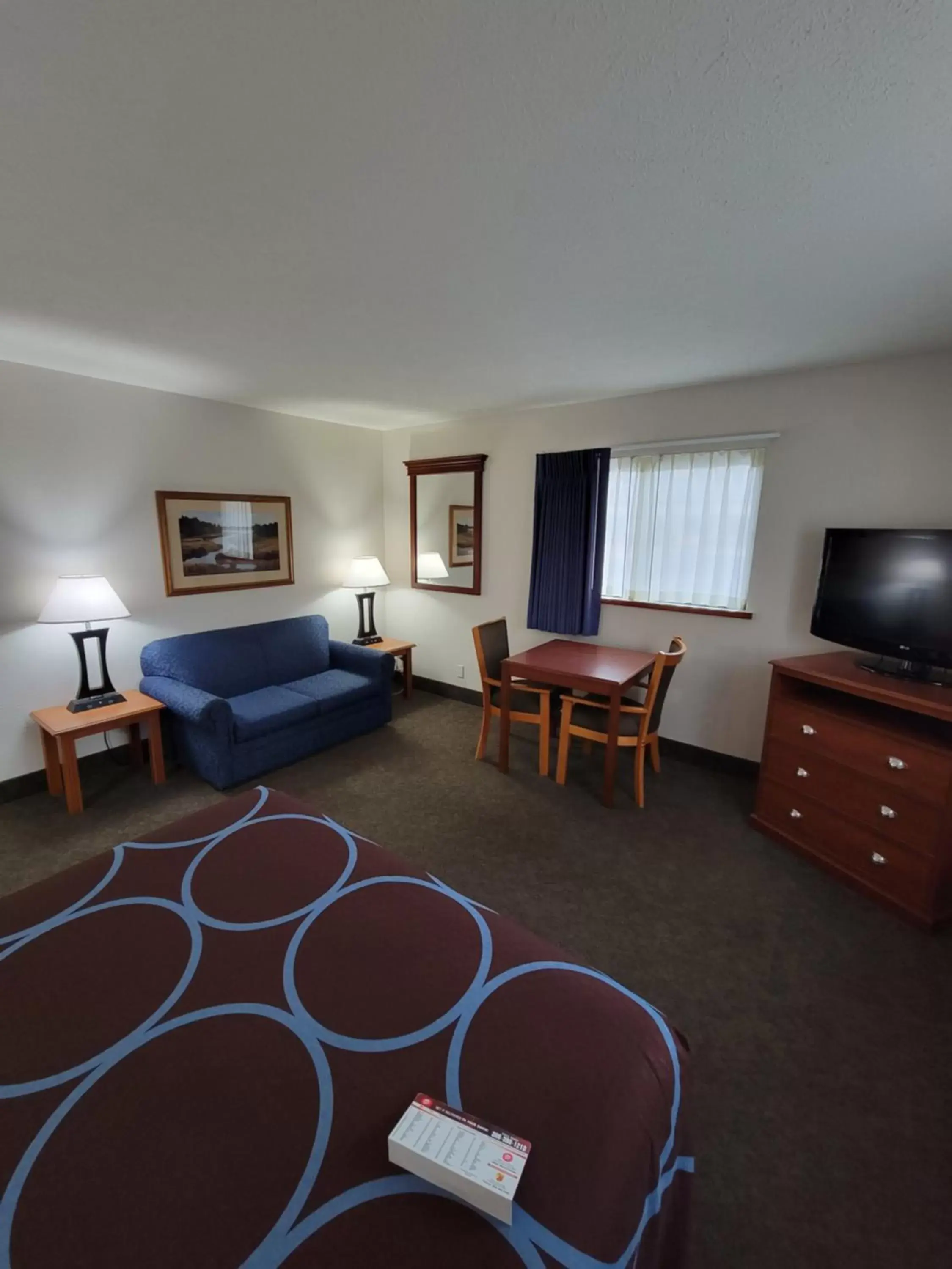 Living room, Seating Area in SureStay Plus Hotel by Best Western Grand Island