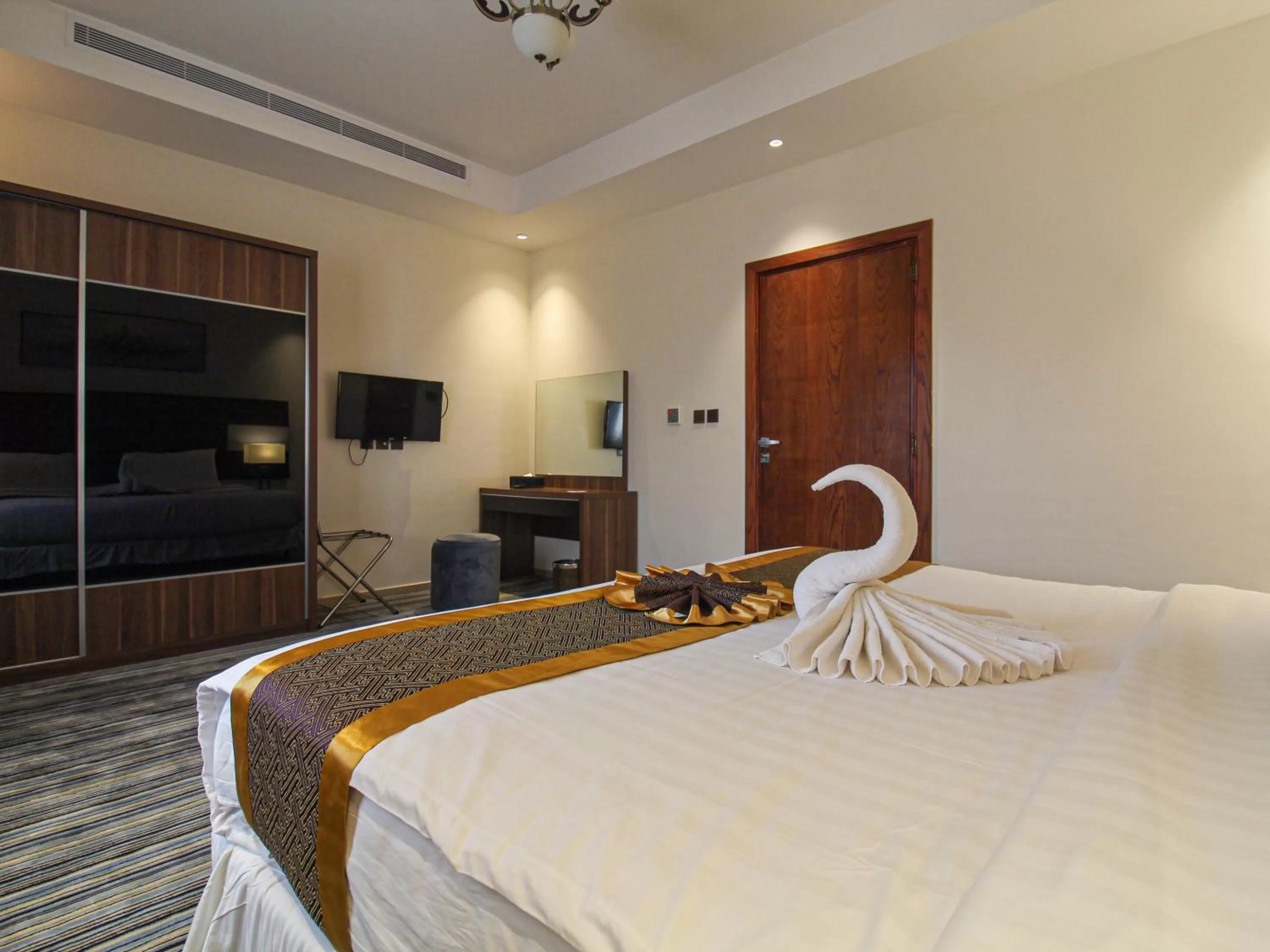 Bed in Friesian Hotel Suites