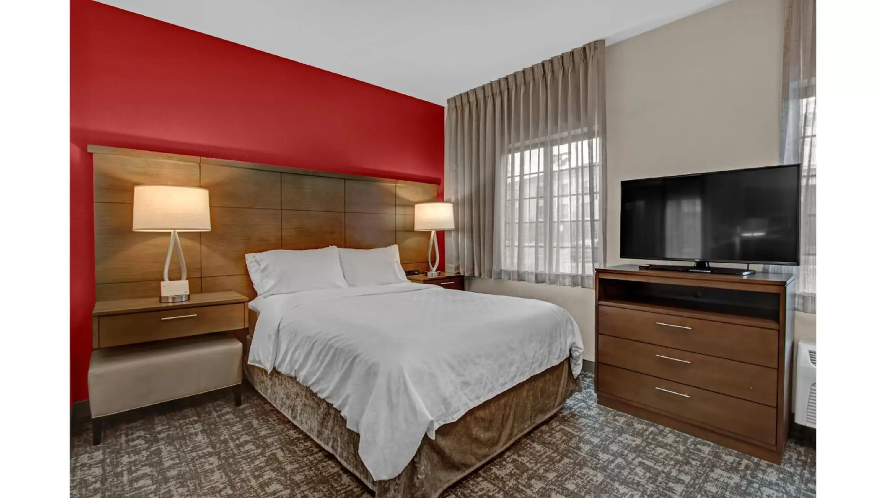 Photo of the whole room, Bed in Staybridge Suites Salt Lake-West Valley City, an IHG Hotel