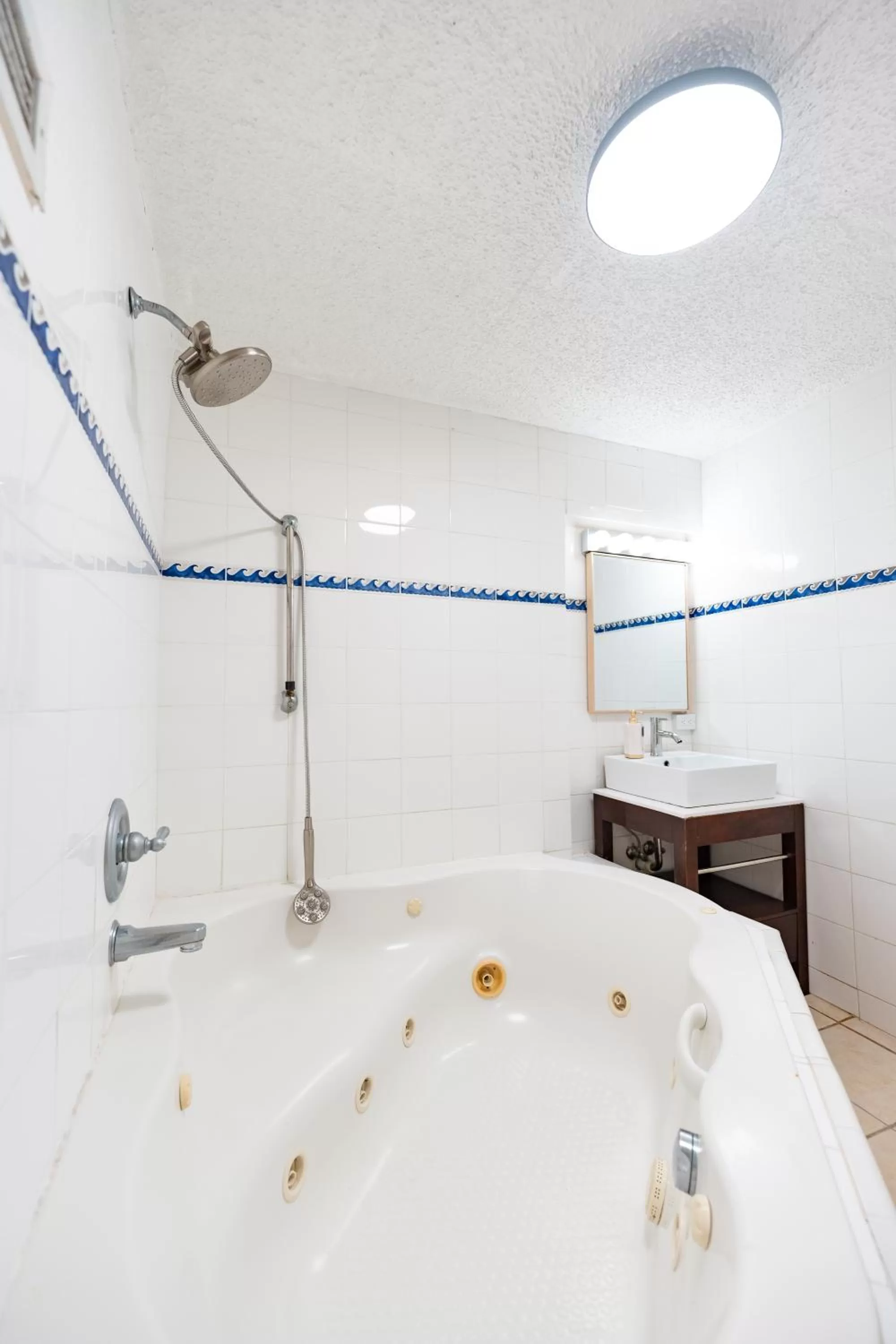 Bathroom in OCEAN VIEW DELUXE SUITE: PVT. BEACH & POOL