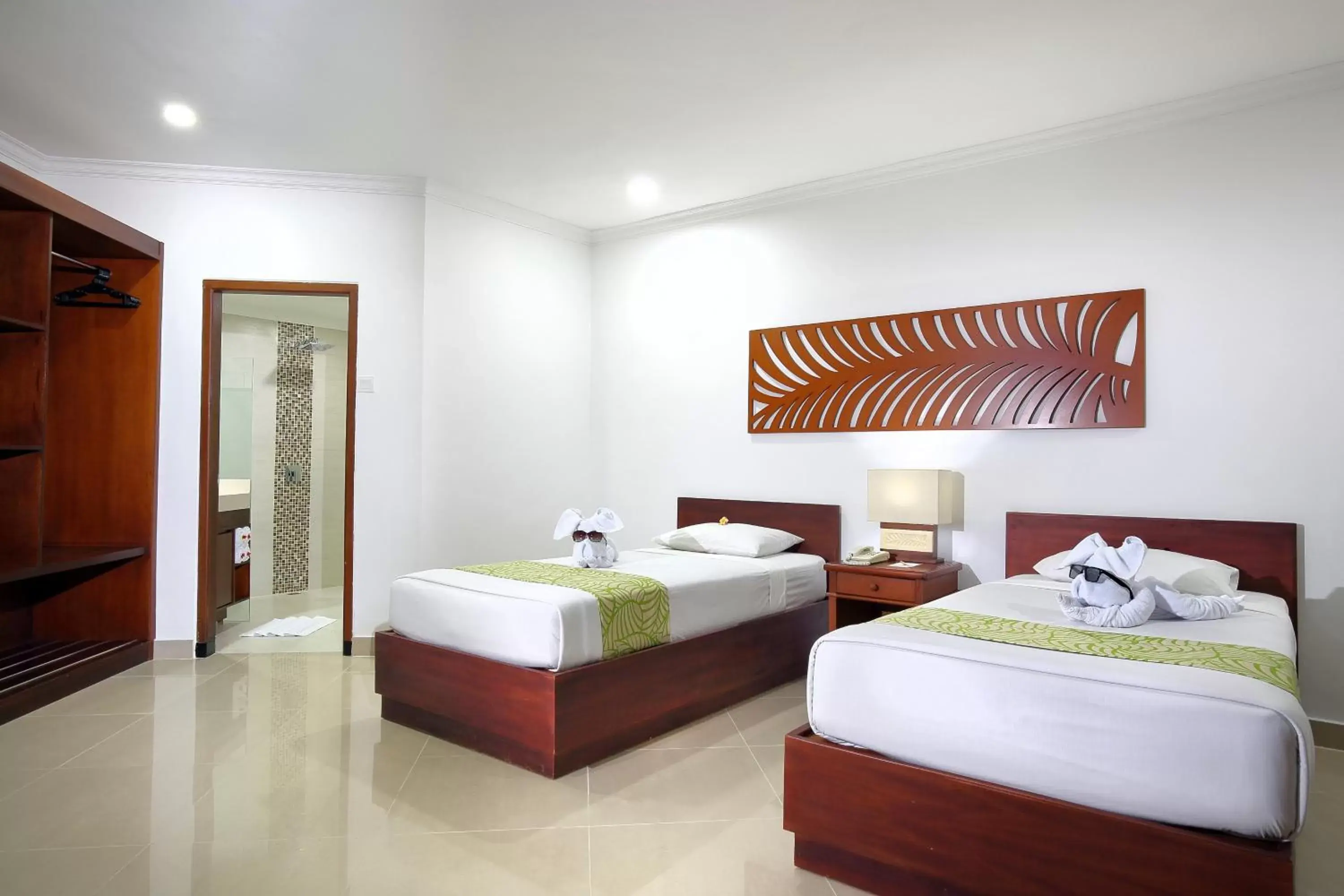Bedroom, Room Photo in Dewi Sri Hotel