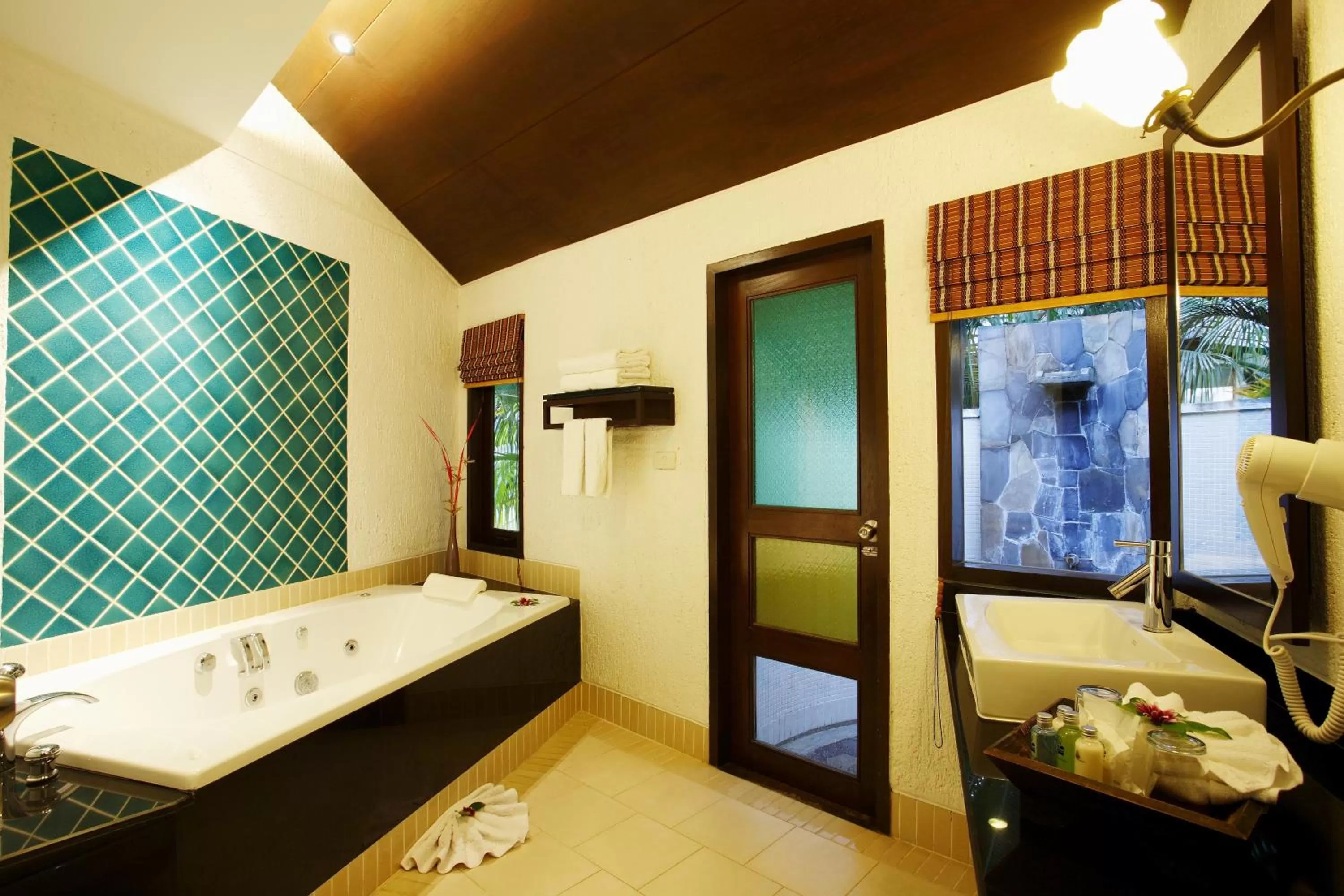 Bathroom, Bed in Peace Laguna Resort & Spa