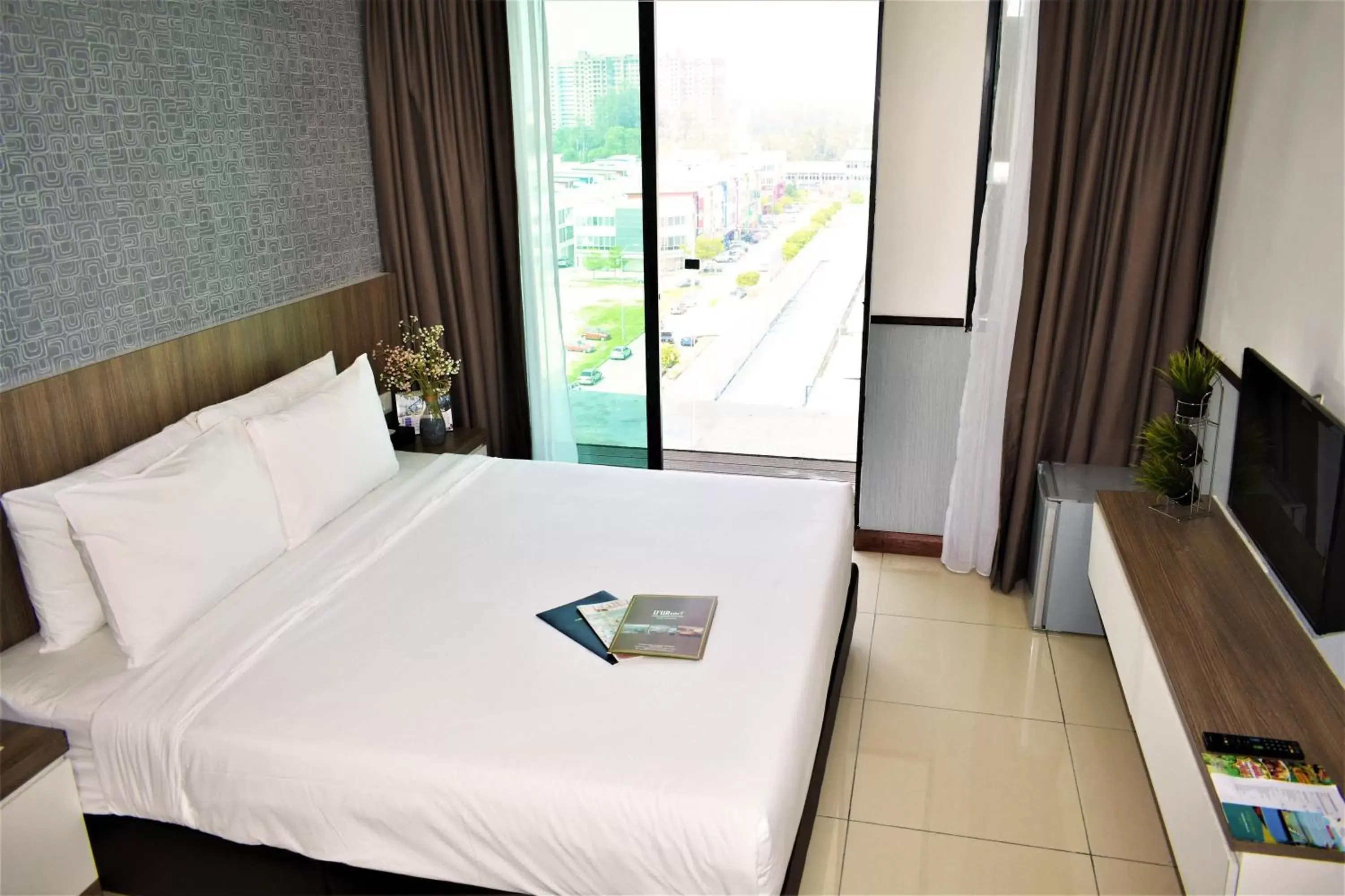 Bed in D'Wharf Hotel & Serviced Residence