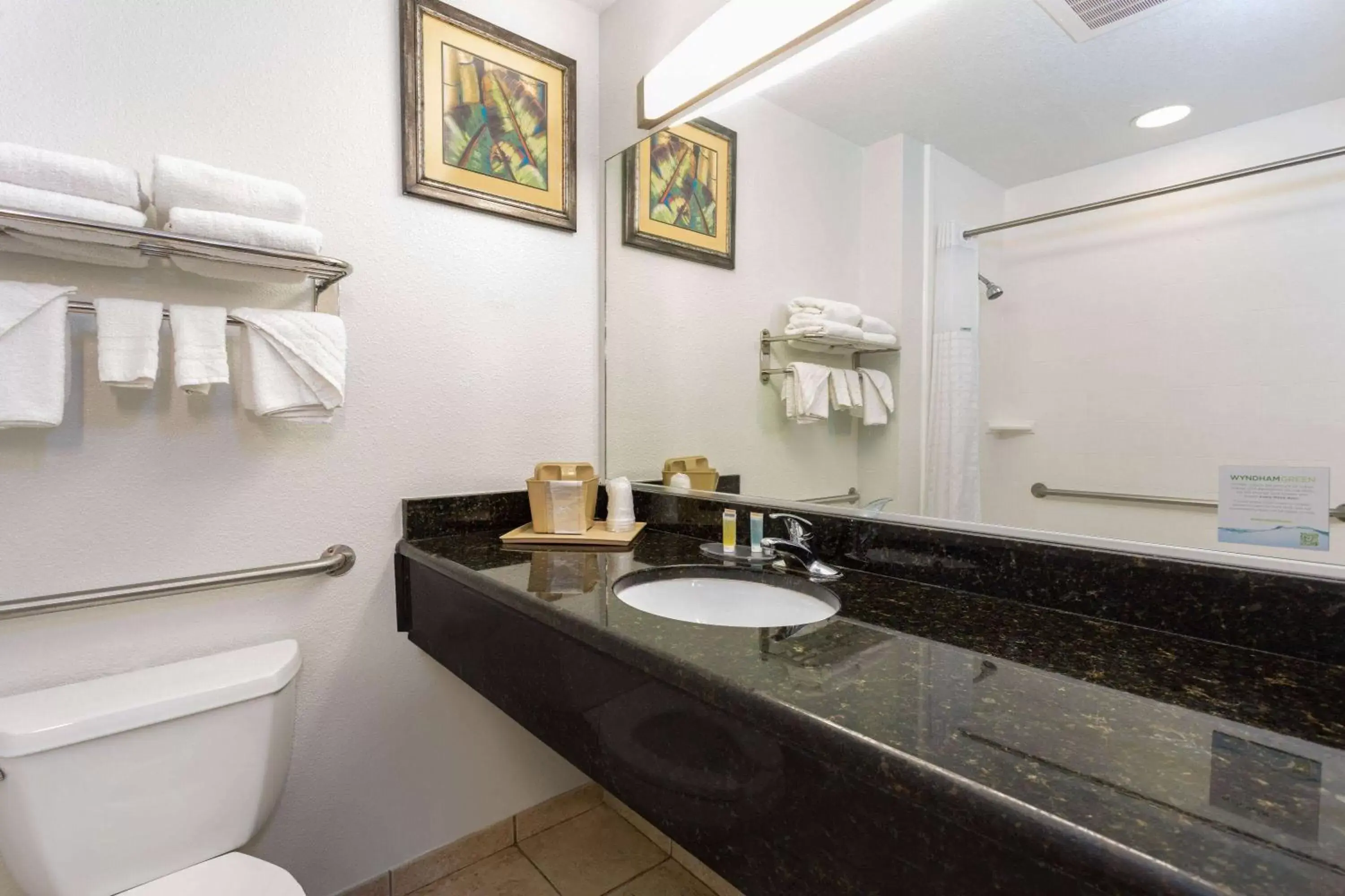 TV and multimedia, Bathroom in Days Inn & Suites by Wyndham Lakeland