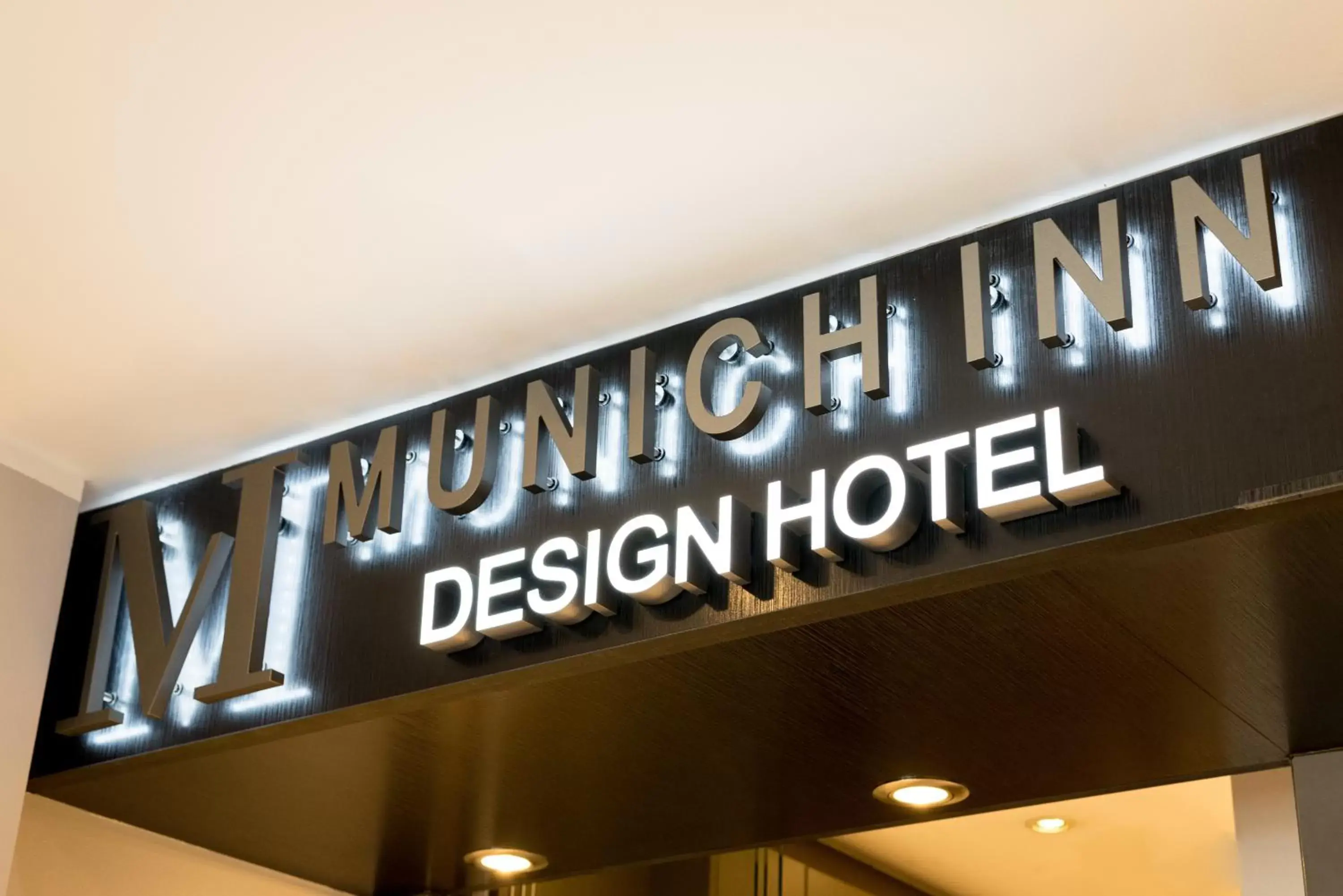 Property logo or sign in Hotel Munich Inn - Design Hotel