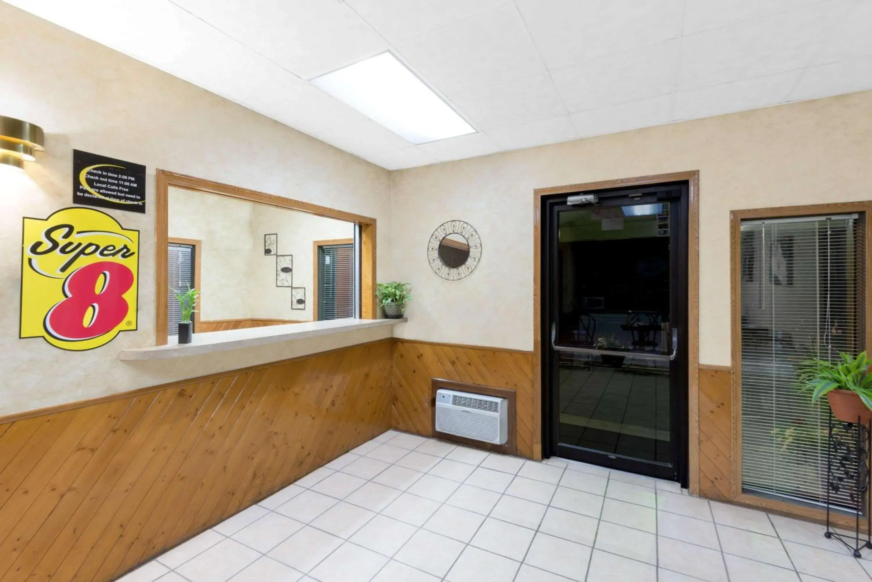 Lobby or reception in Super 8 by Wyndham Algona Lobby or reception in Super 8 by Wyndham Algona