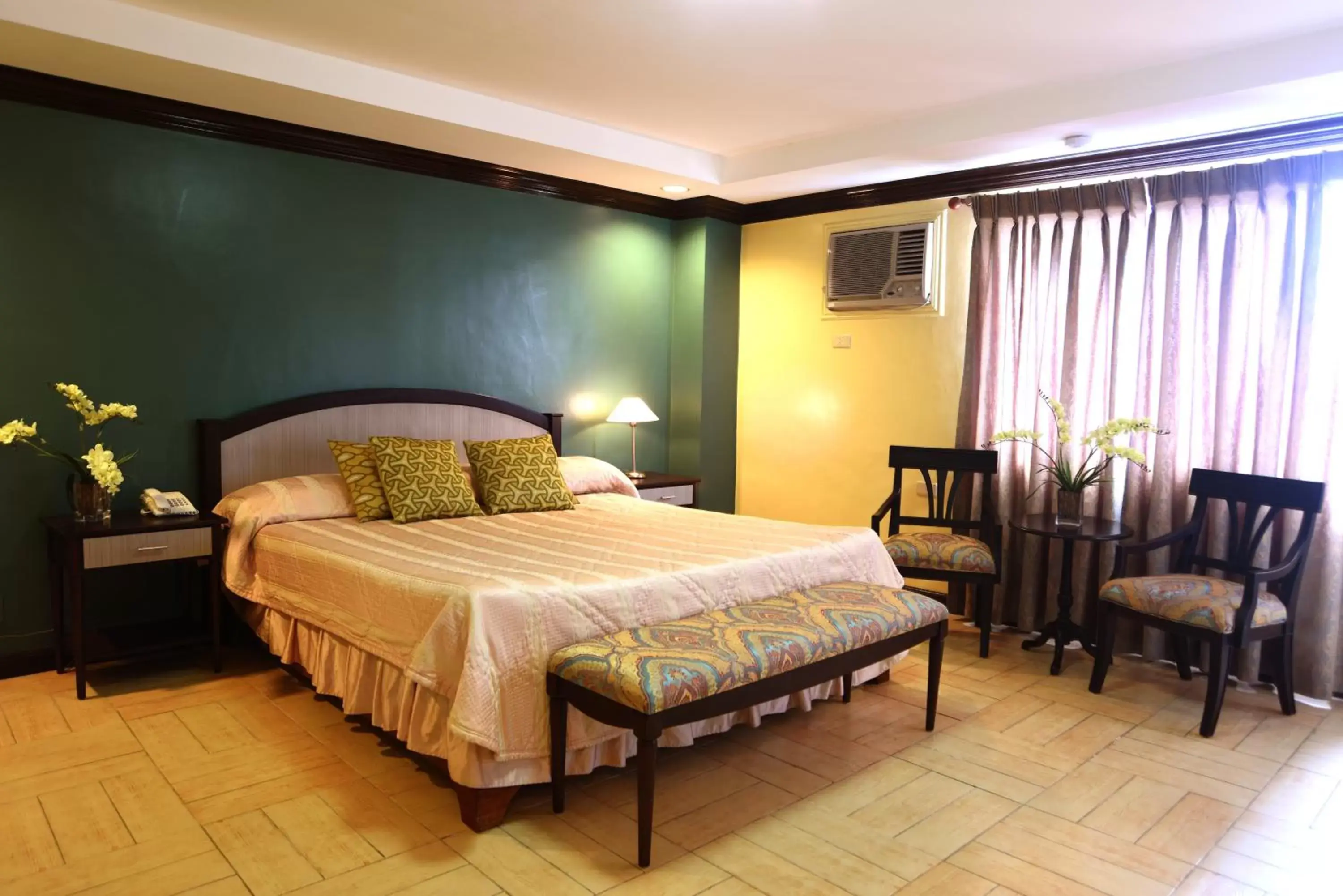 Photo of the whole room, Bed in Tagaytay Country Hotel