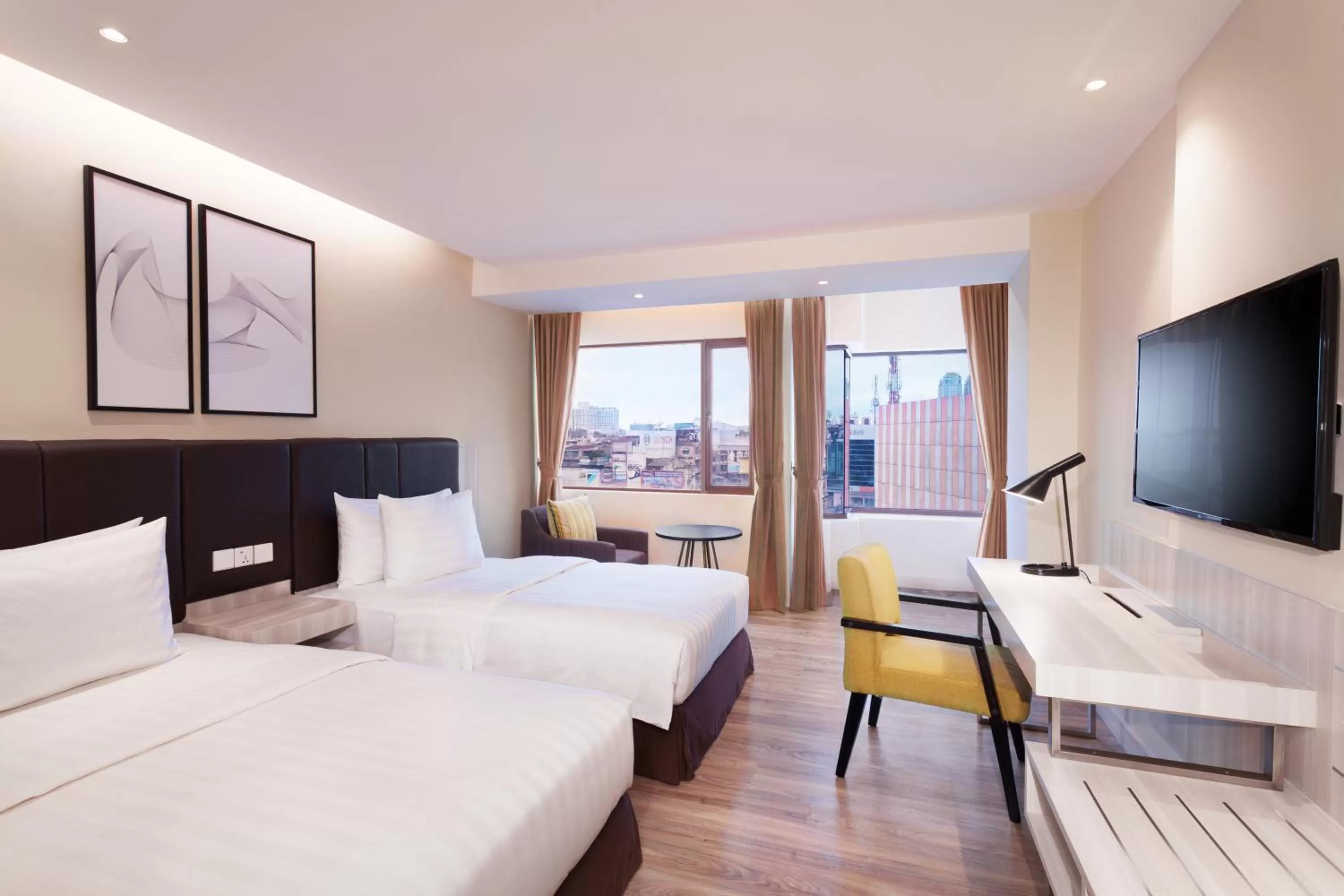 Photo of the whole room, Bed in AIHO Hotel Medan