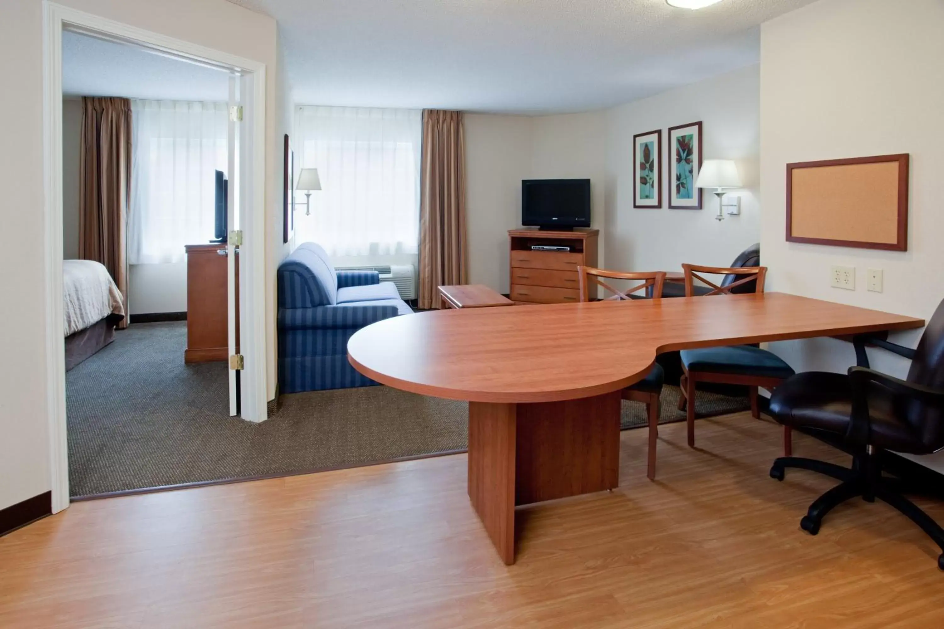 Bedroom, Kitchen/Kitchenette in Candlewood Suites Colonial Heights - Fort Lee, an IHG Hotel