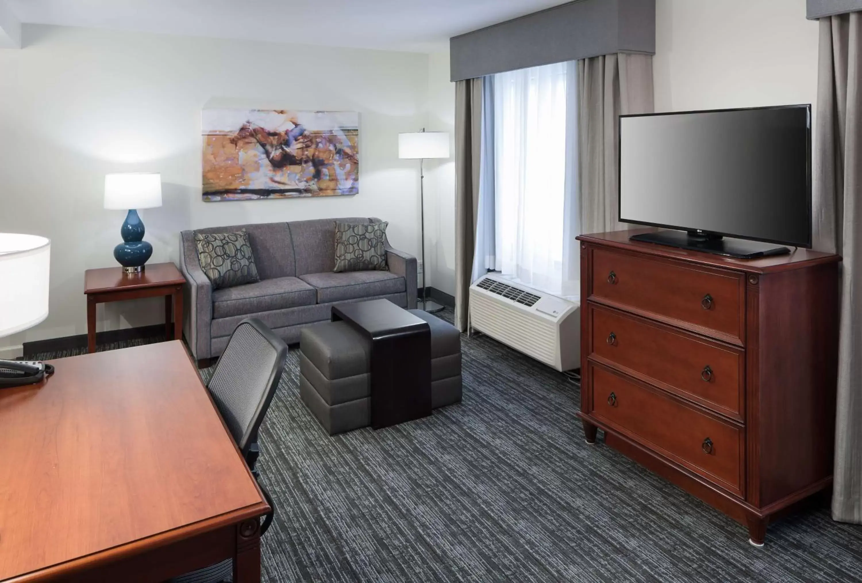 Bedroom, TV/Entertainment Center in Homewood Suites Denton