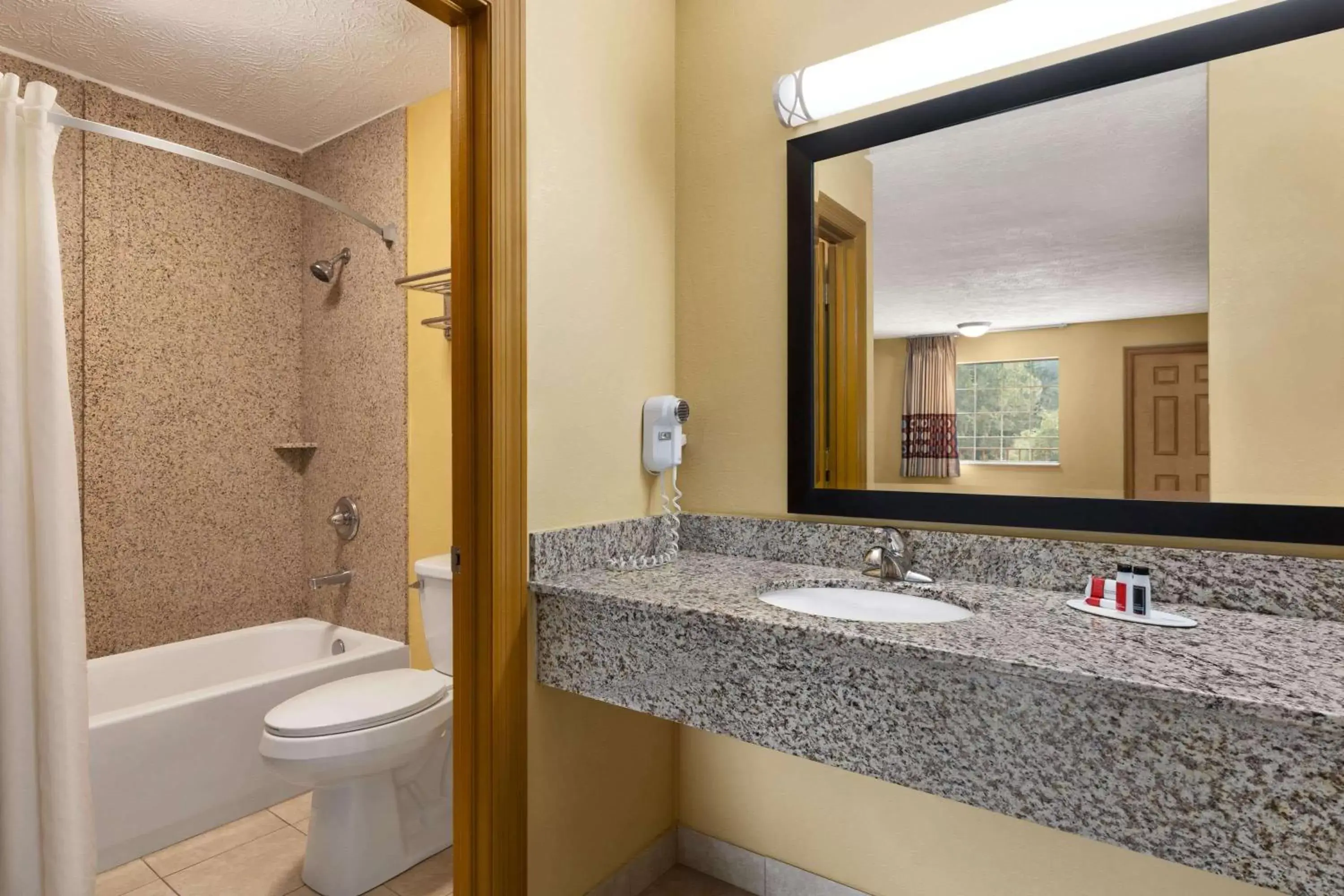 Bathroom in Super 8 by Wyndham Whites Creek/ Nashville NW Area