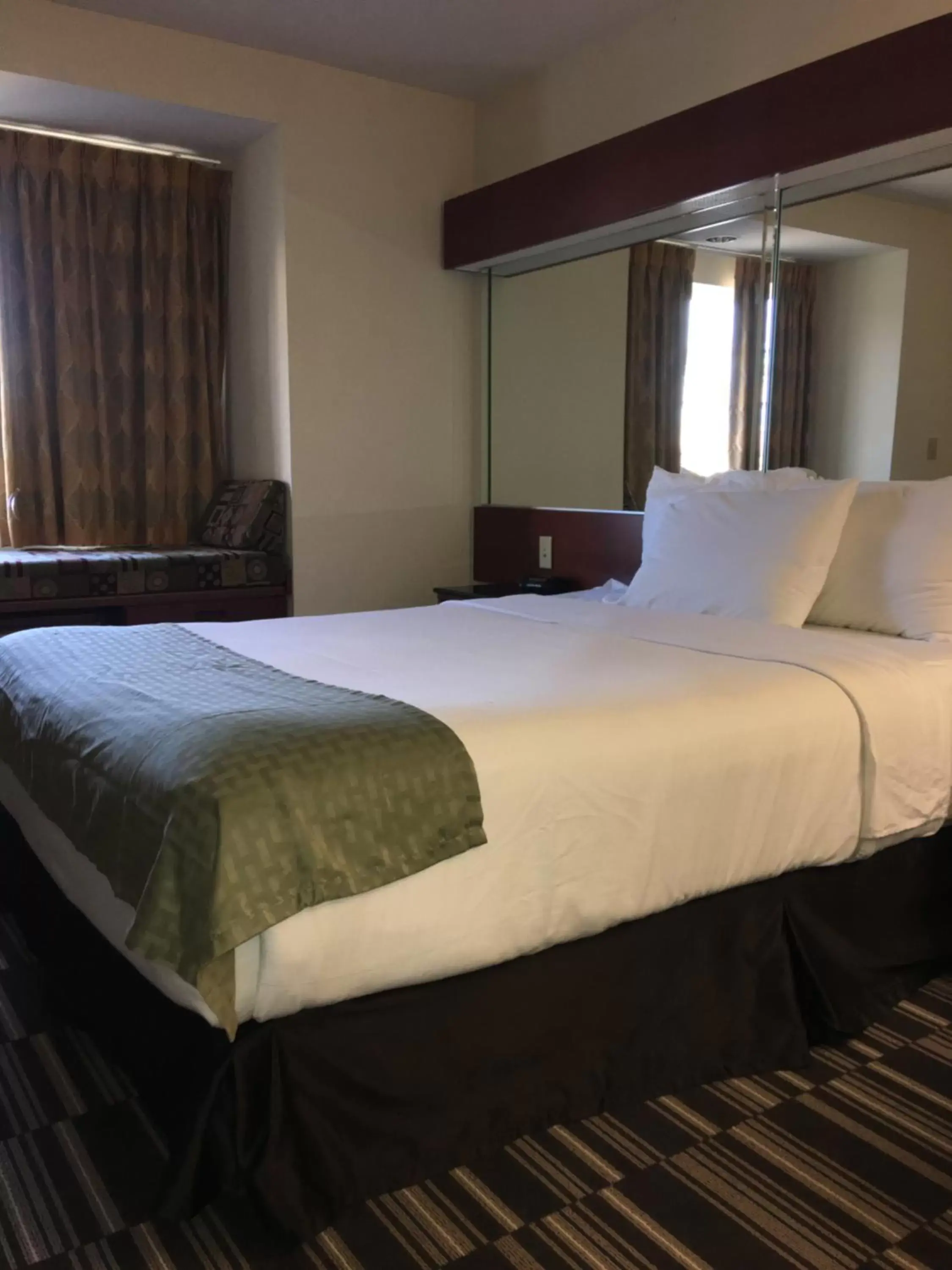 Photo of the whole room, Bed in Microtel Inn & Suites by Wyndham Indianapolis Airport