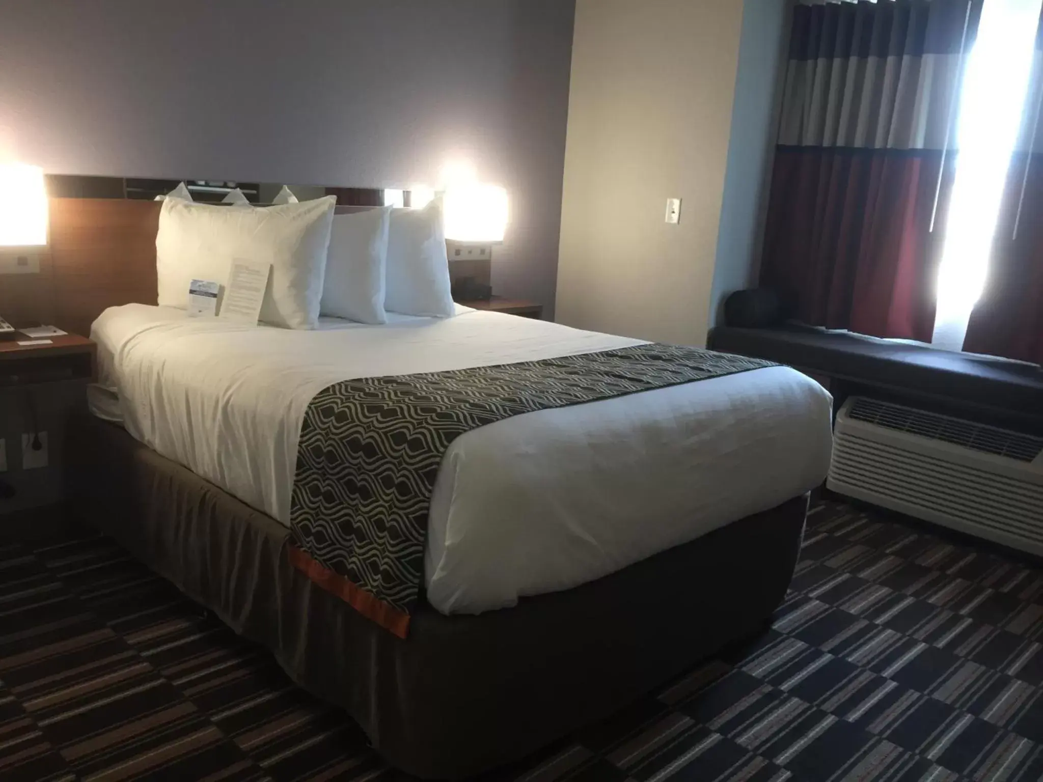 Bed in Microtel Inn & Suites by Wyndham Sweetwater