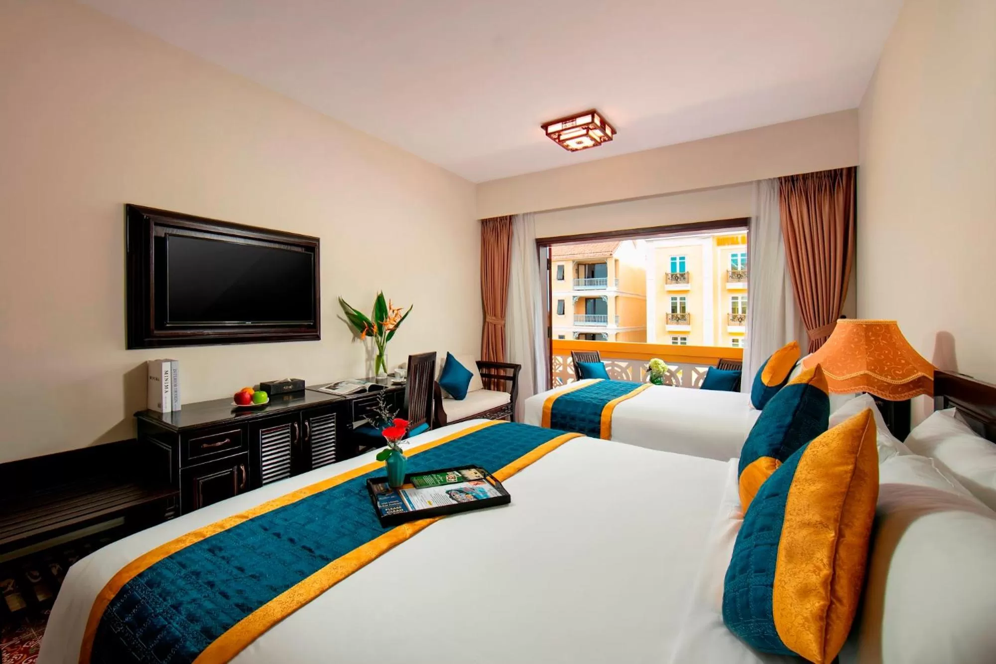 Bed in La Charm Hoi An Hotel & Spa