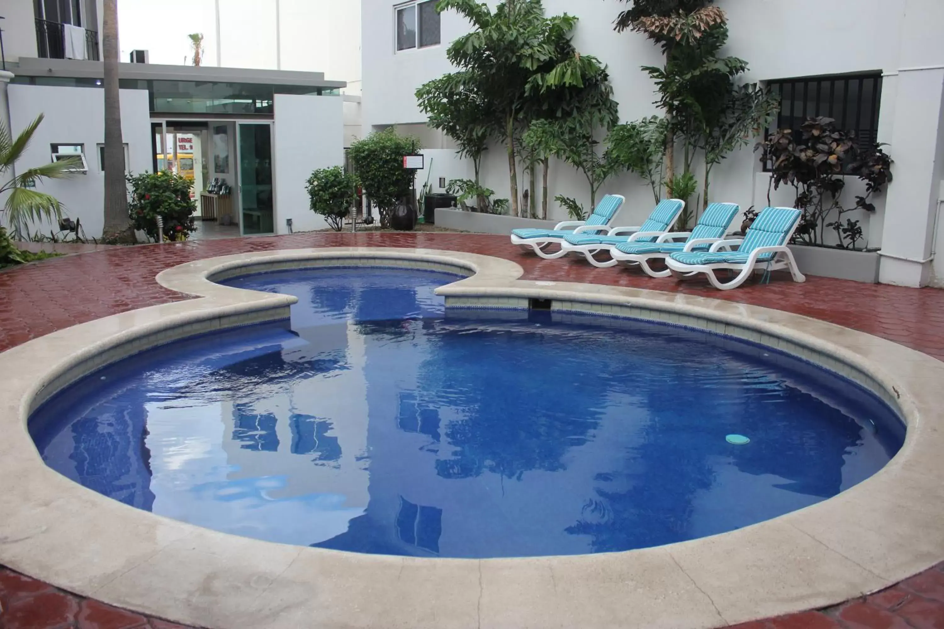 Day, Swimming Pool in Seven Crown Express & Suites by Kavia