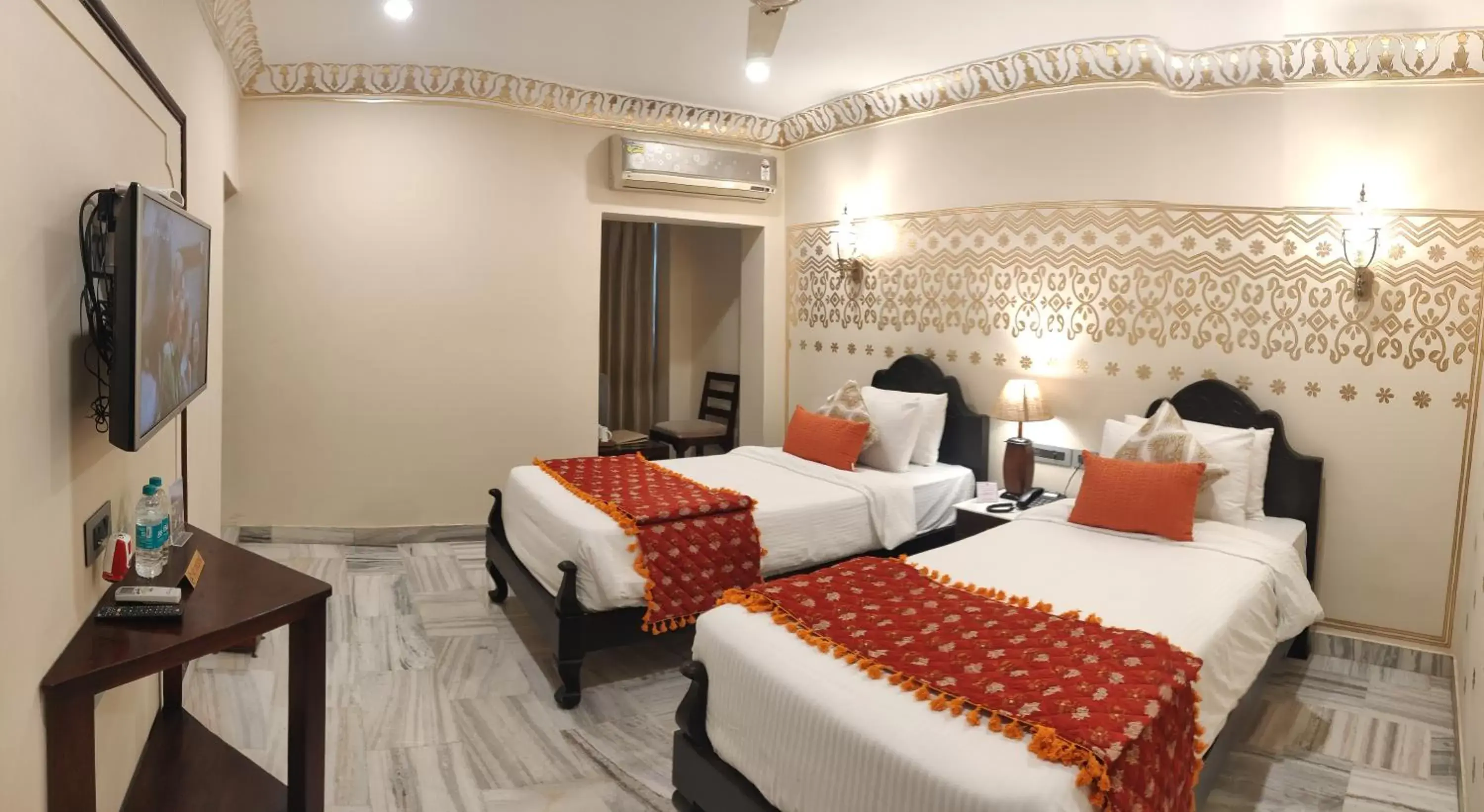 Bed in Laxmi Palace Heritage Boutique Hotel